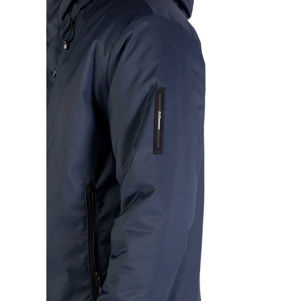 Indulge in the elegance of the EA7 Emporio Armani Blue Polyester Coat, a luxurious blend of contemporary design and exceptional craftsmanship, perfect for sophisticated outings.