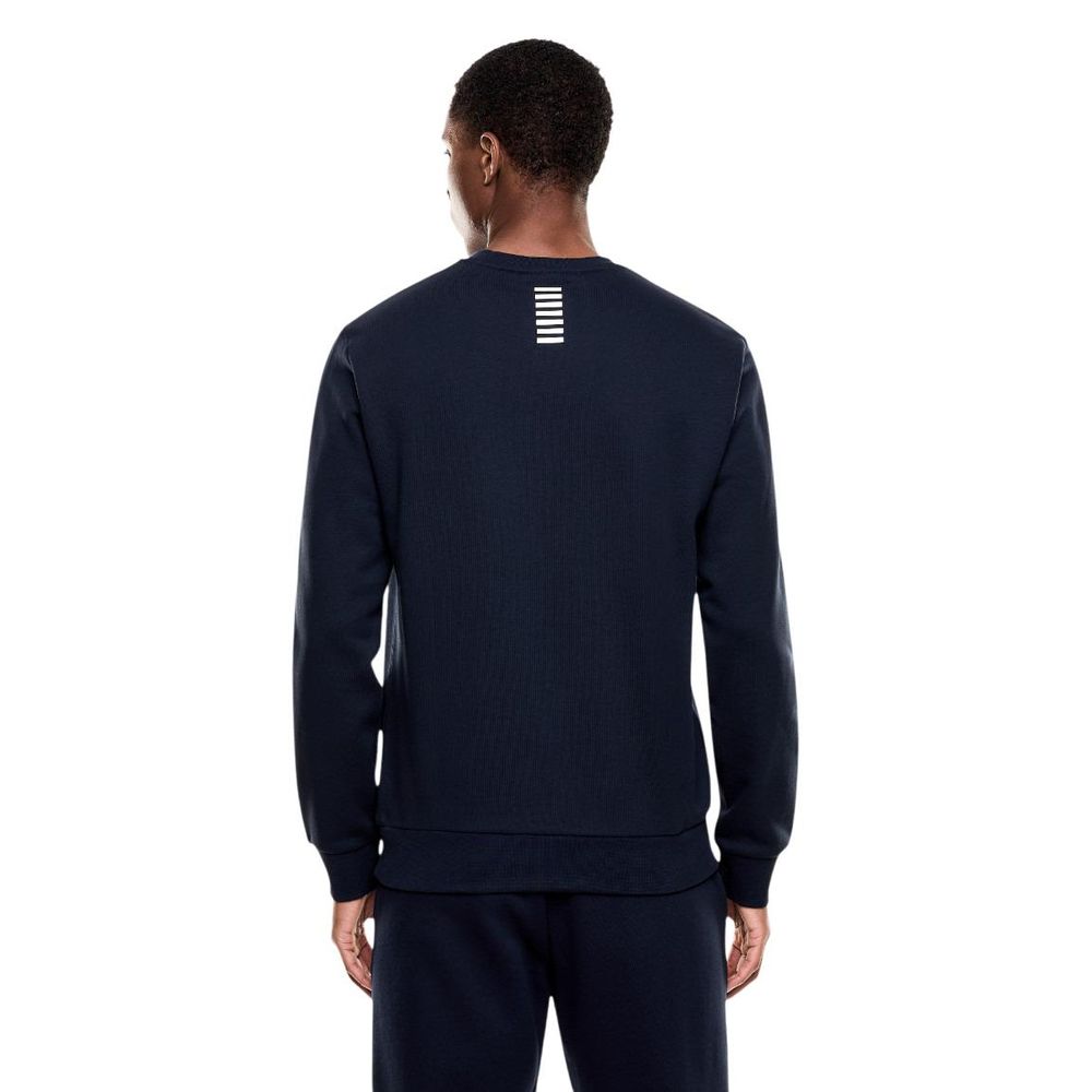 Elevate your wardrobe with the EA7 Emporio Armani Blue Cotton Sweatshirt, a luxurious blend of comfort and style, embodying timeless elegance for the discerning individual.