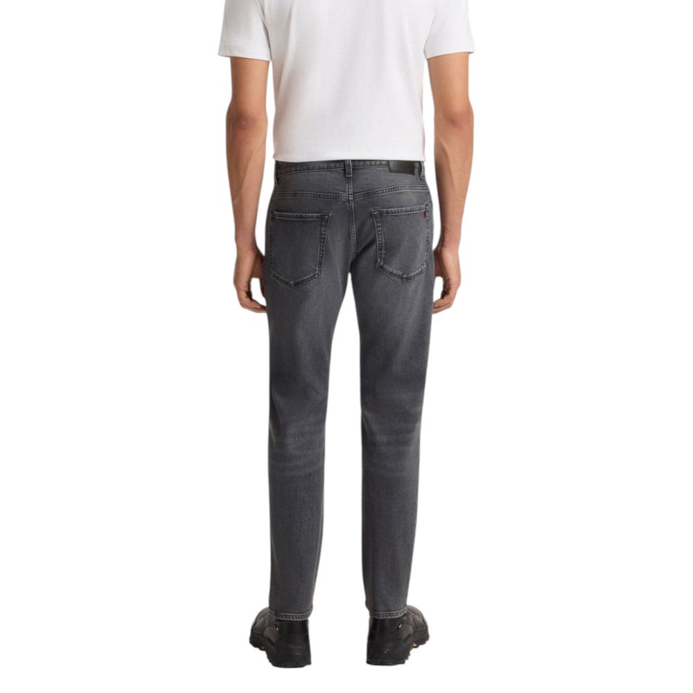 Indulge in the luxurious allure of Hugo Boss Gray Cotton Relaxed Fit Jeans, crafted for effortless elegance and refined comfort, perfect for any sophisticated occasion.