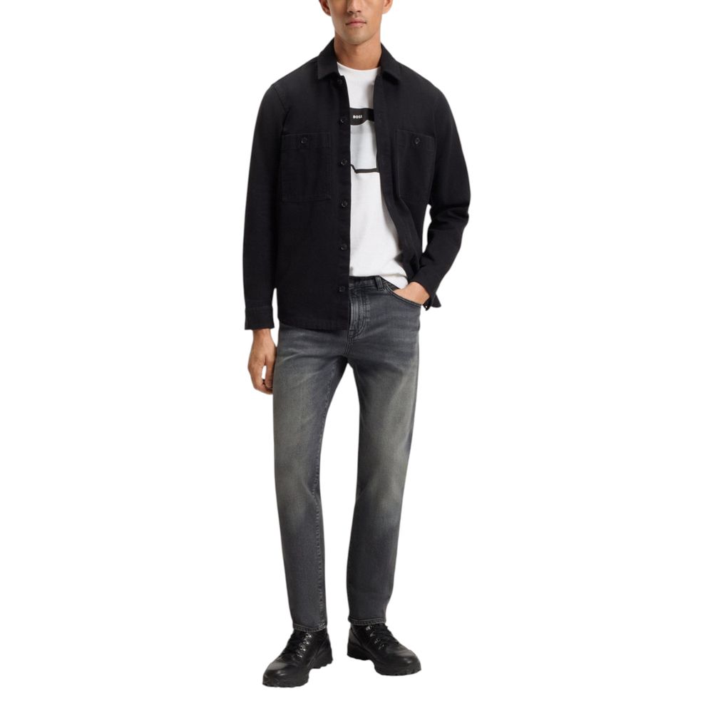 Discover the Hugo Boss Gray Cotton Relaxed Fit Jeans, a blend of luxurious comfort and contemporary style, perfect for effortless sophistication in any setting.