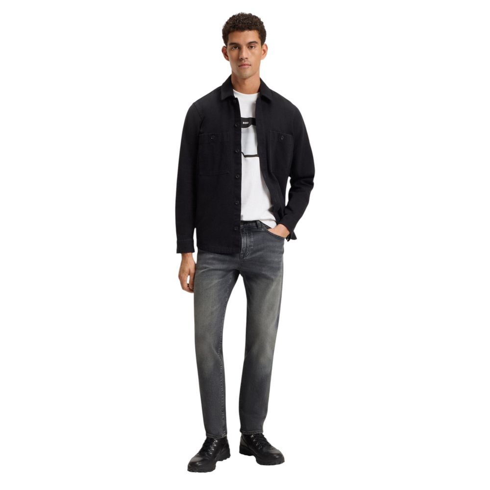 Discover the Hugo Boss Gray Cotton Relaxed Fit Jeans, where luxurious fabric meets contemporary style, perfect for elevating your sophisticated wardrobe.