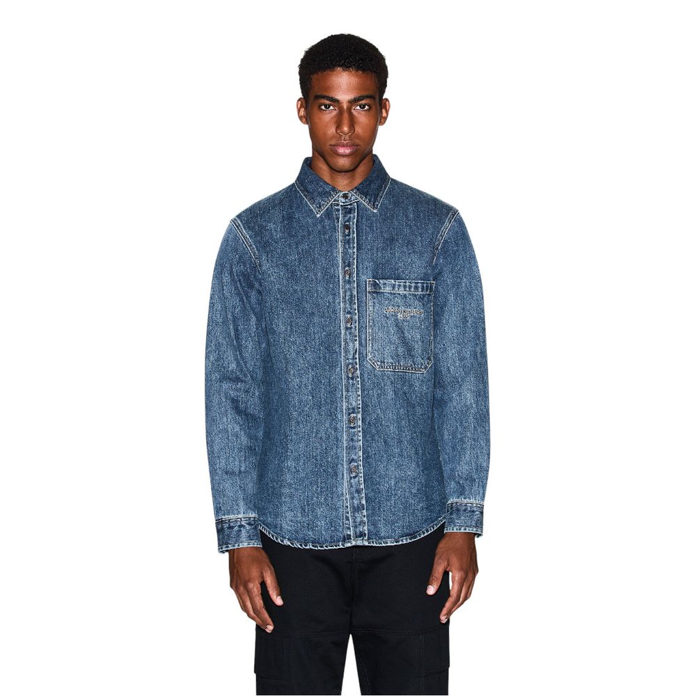 Elevate your wardrobe with the Armani Exchange Blue Denim Shirt from the FW25 collection, a luxurious blend of cotton and sophistication for timeless elegance.