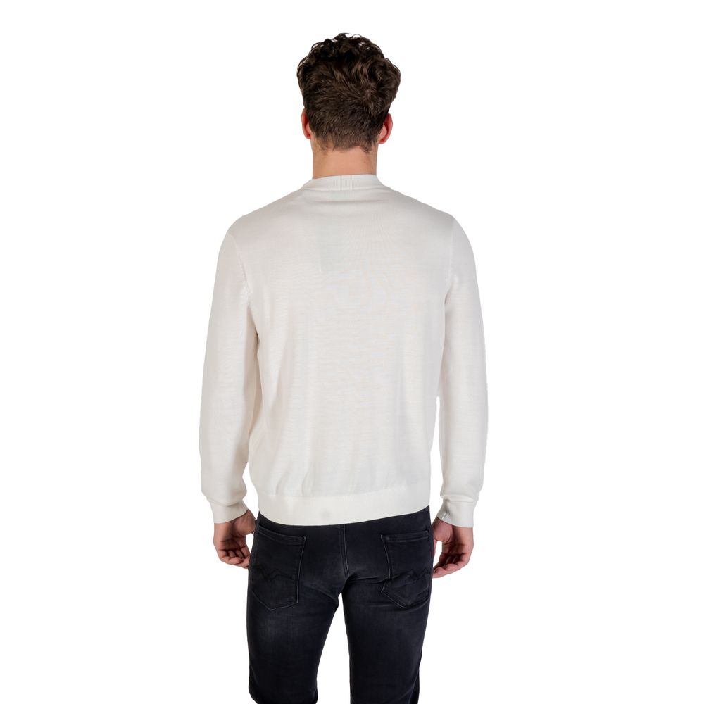 Elevate your wardrobe with the Armani Exchange White Marabou Sweatshirt, a luxurious blend of acrylic and wool that embodies timeless elegance and sophisticated comfort.