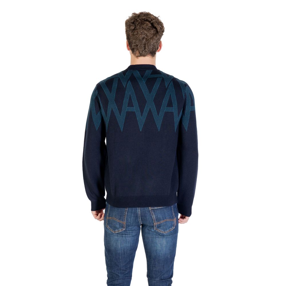 Elevate your wardrobe with the Armani Exchange Black Marabou Sweatshirt, a luxurious blend of acrylic, cotton, and wool, embodying modern sophistication and timeless elegance.