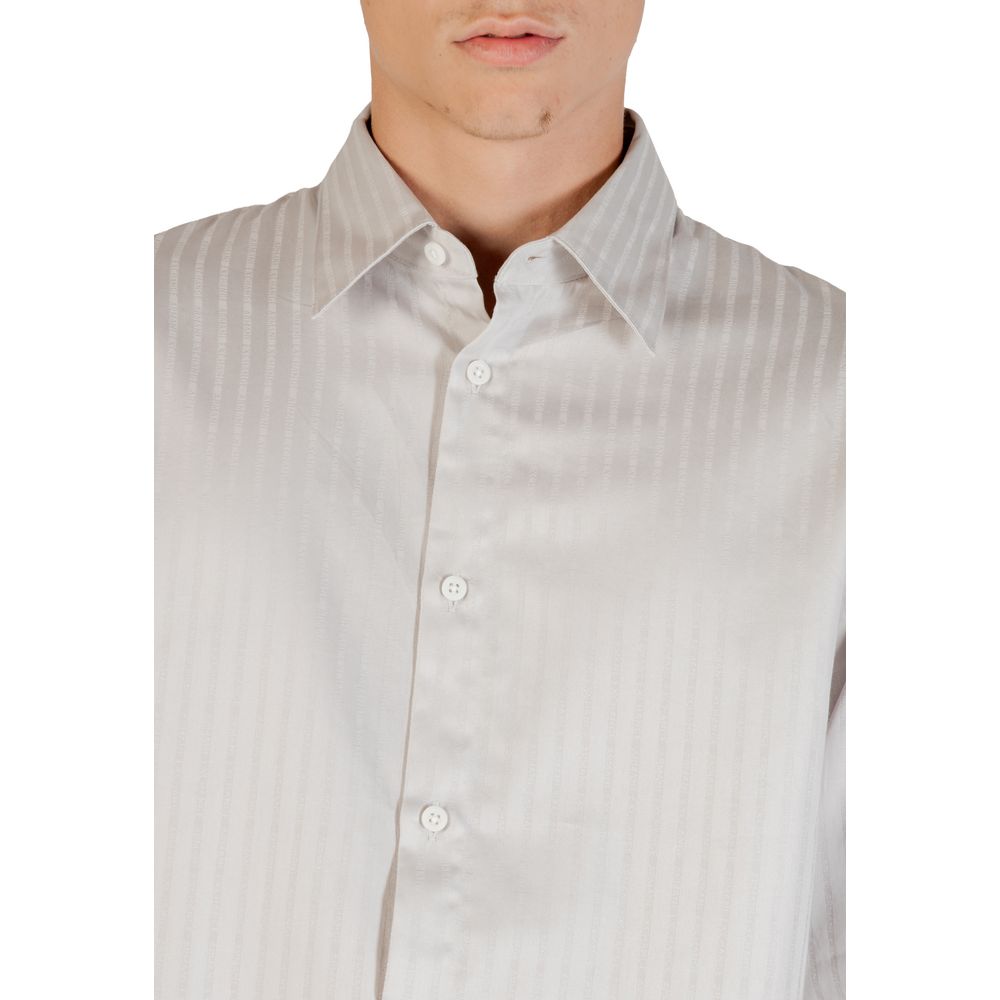 Elevate your wardrobe with the Armani Exchange Gray Cotton Pattern Shirt, crafted from luxurious cotton for timeless elegance and effortless sophistication.