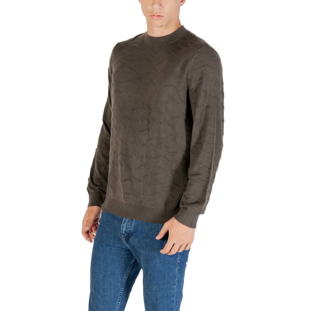 Indulge in the Armani Exchange Green Marabou Sweatshirt, a luxurious blend of acrylic and wool, epitomizing timeless elegance and sophisticated comfort for any occasion.