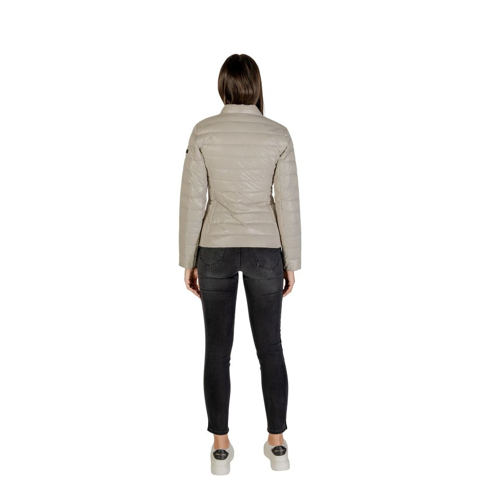 Experience the exquisite Armani Exchange Beige Polyamide Coat, a luxurious quilted design crafted for warmth and elegance, perfect for the discerning individual.