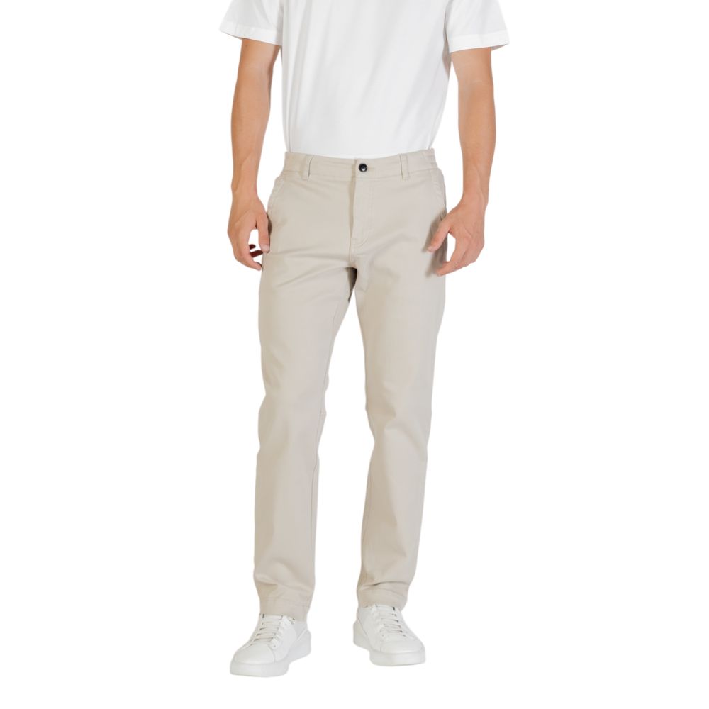 Elevate your wardrobe with Hugo Boss Beige Polyester Casual Pants, a luxurious blend of comfort and sophistication, perfect for the discerning individual seeking timeless elegance.