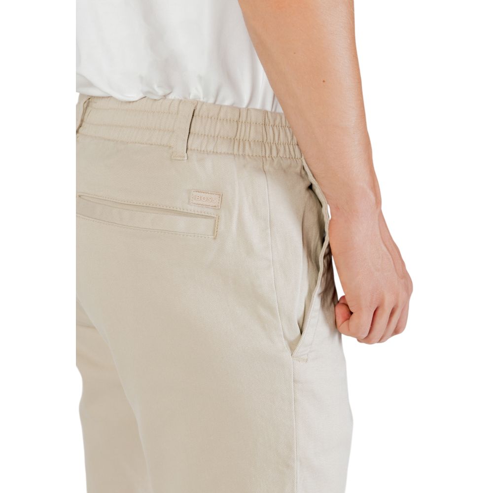 Elevate your wardrobe with Hugo Boss Beige Polyester Casual Pants, a masterpiece of luxury craftsmanship and timeless elegance, perfect for the discerning individual.