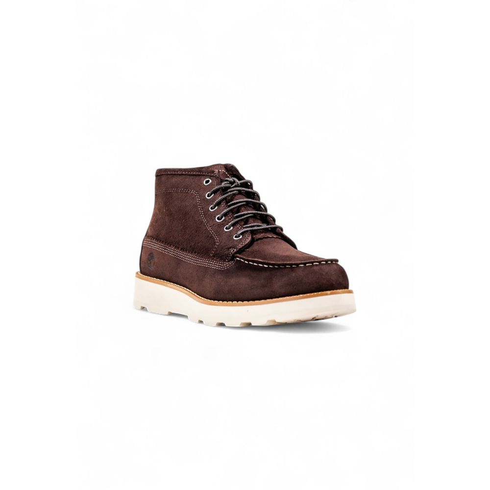 Elevate your style with Timberland Brown Leather Lace-Up Boots, crafted from high-quality leather for unparalleled luxury and timeless sophistication.