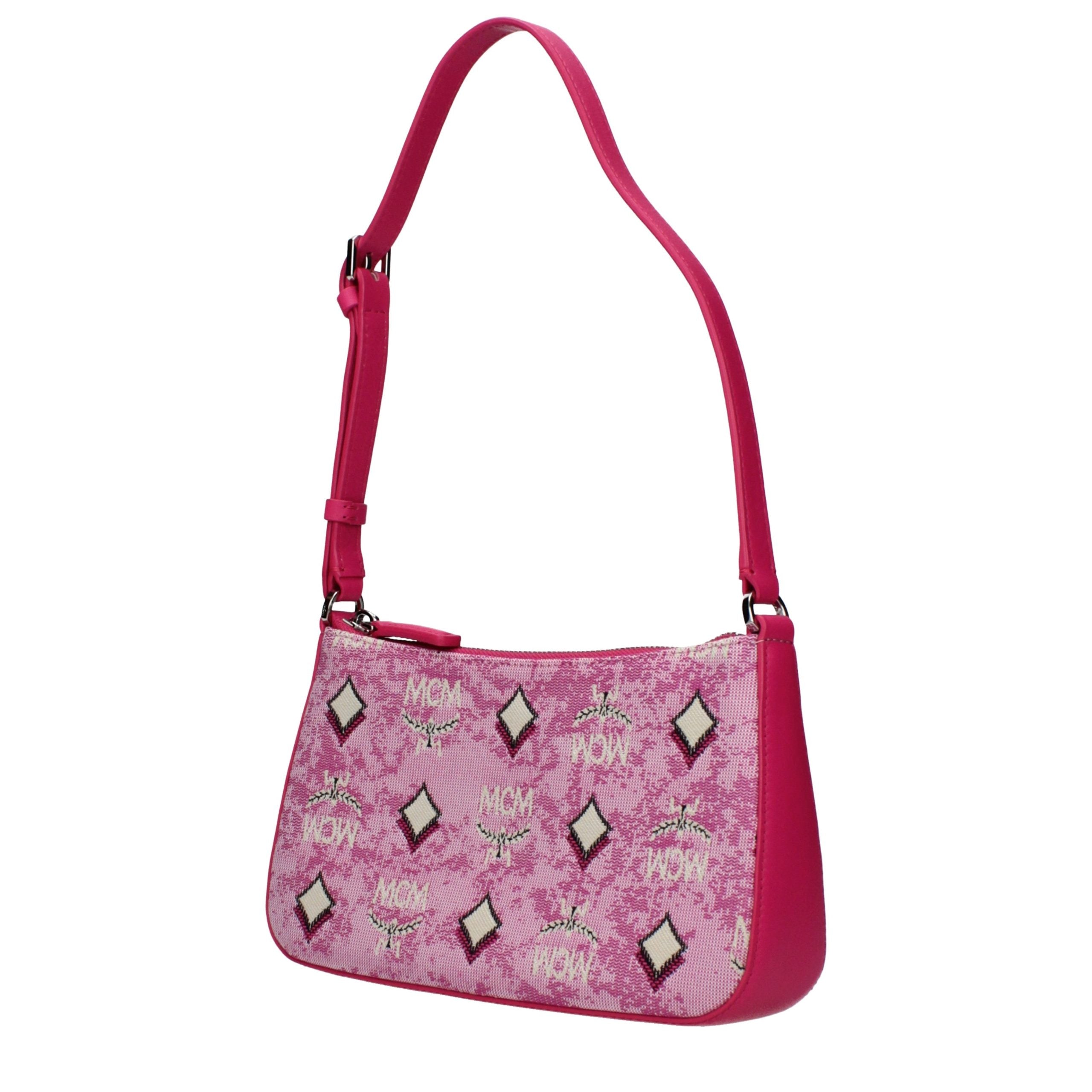 Elevate your style with the MCM Pink Fabric Crossbody Bag, a luxurious blend of exquisite craftsmanship and chic aesthetics, perfect for any occasion.