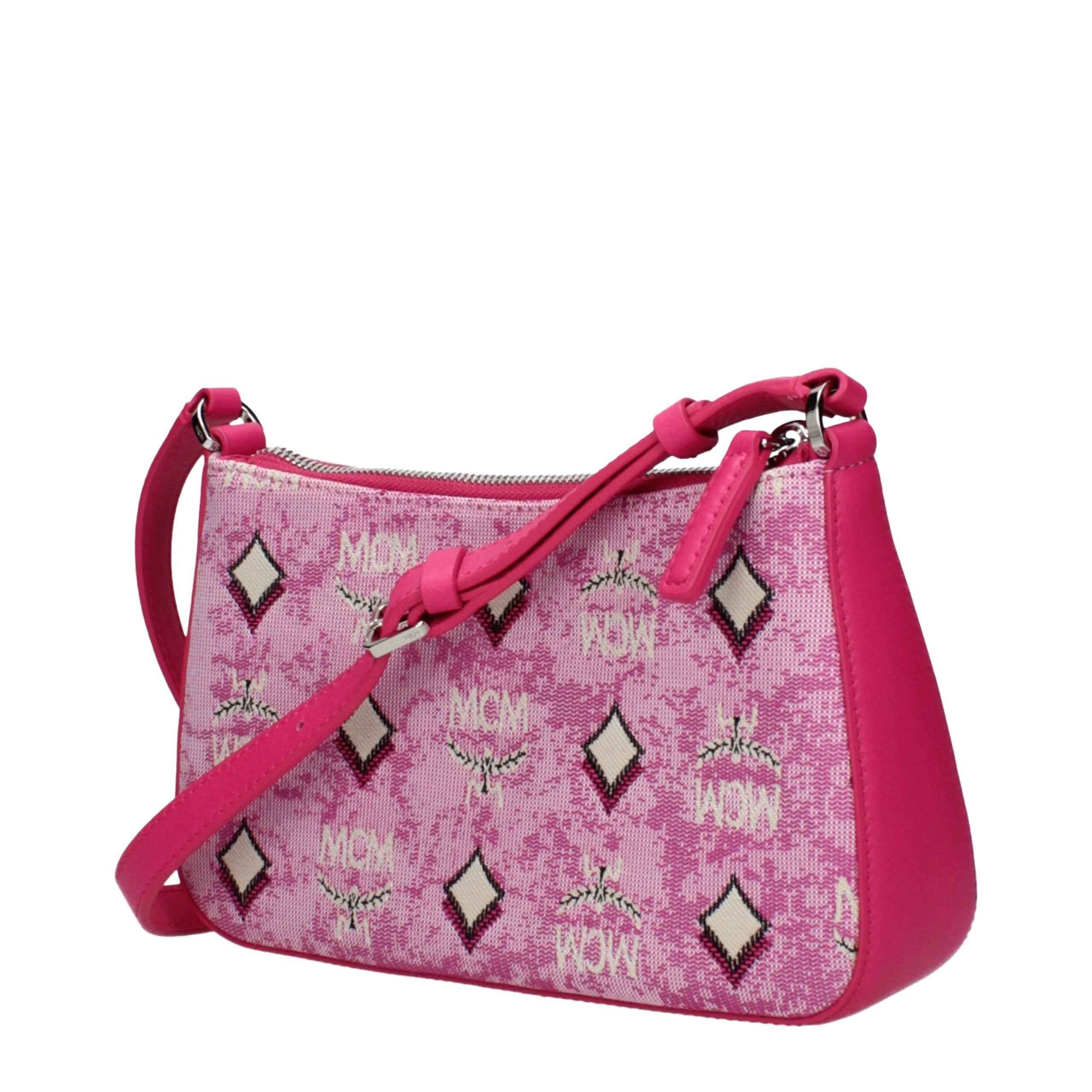 Indulge in the exquisite MCM Pink Fabric Crossbody Bag, a luxurious blend of artistry and elegance, perfect for the discerning individual seeking timeless sophistication.