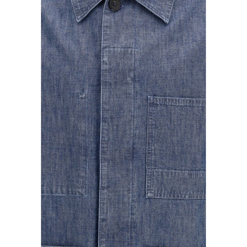 Discover the Jil Sander Blue Cotton Denim Jacket, a masterpiece of minimalist design crafted from premium cotton, embodying timeless elegance and luxurious versatility.