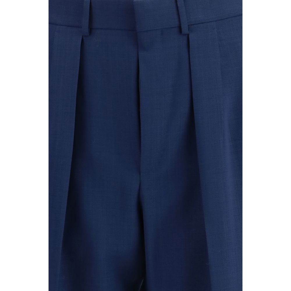 Indulge in the exquisite Tom Ford Bicolor Wool Dress Pants, crafted from sumptuous 100% wool, embodying timeless elegance and modern sophistication for discerning tastes.