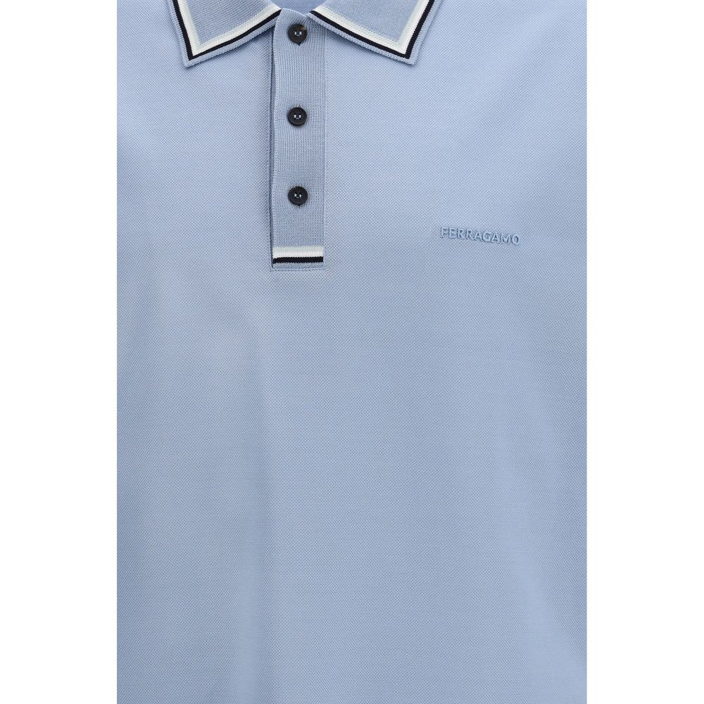 Elevate your wardrobe with the Ferragamo Blue Cotton Polo Shirt, a timeless blend of luxurious cotton and exquisite craftsmanship for discerning tastes.