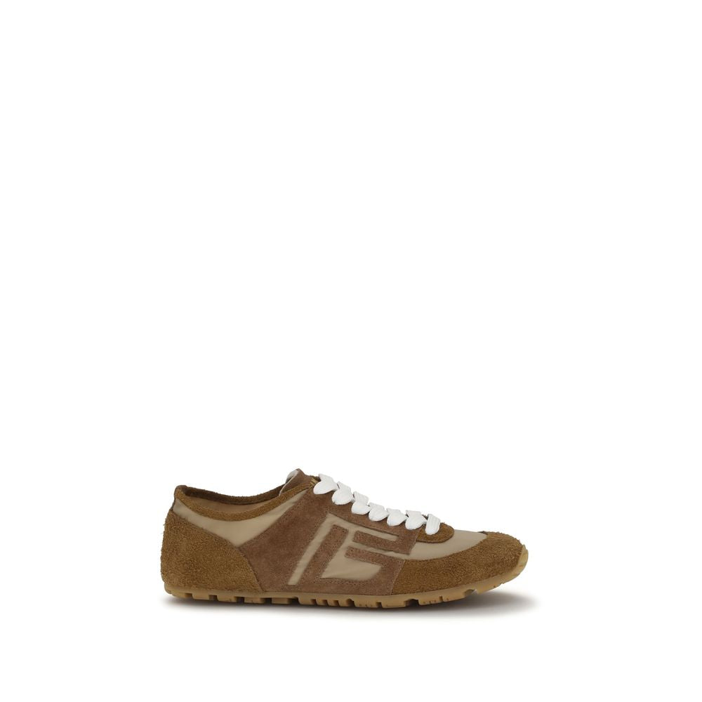 Discover the Balmain Beige Calf Leather Bos Taurus Athletic Sneakers, where exquisite craftsmanship meets modern luxury, elevating your style with every step.