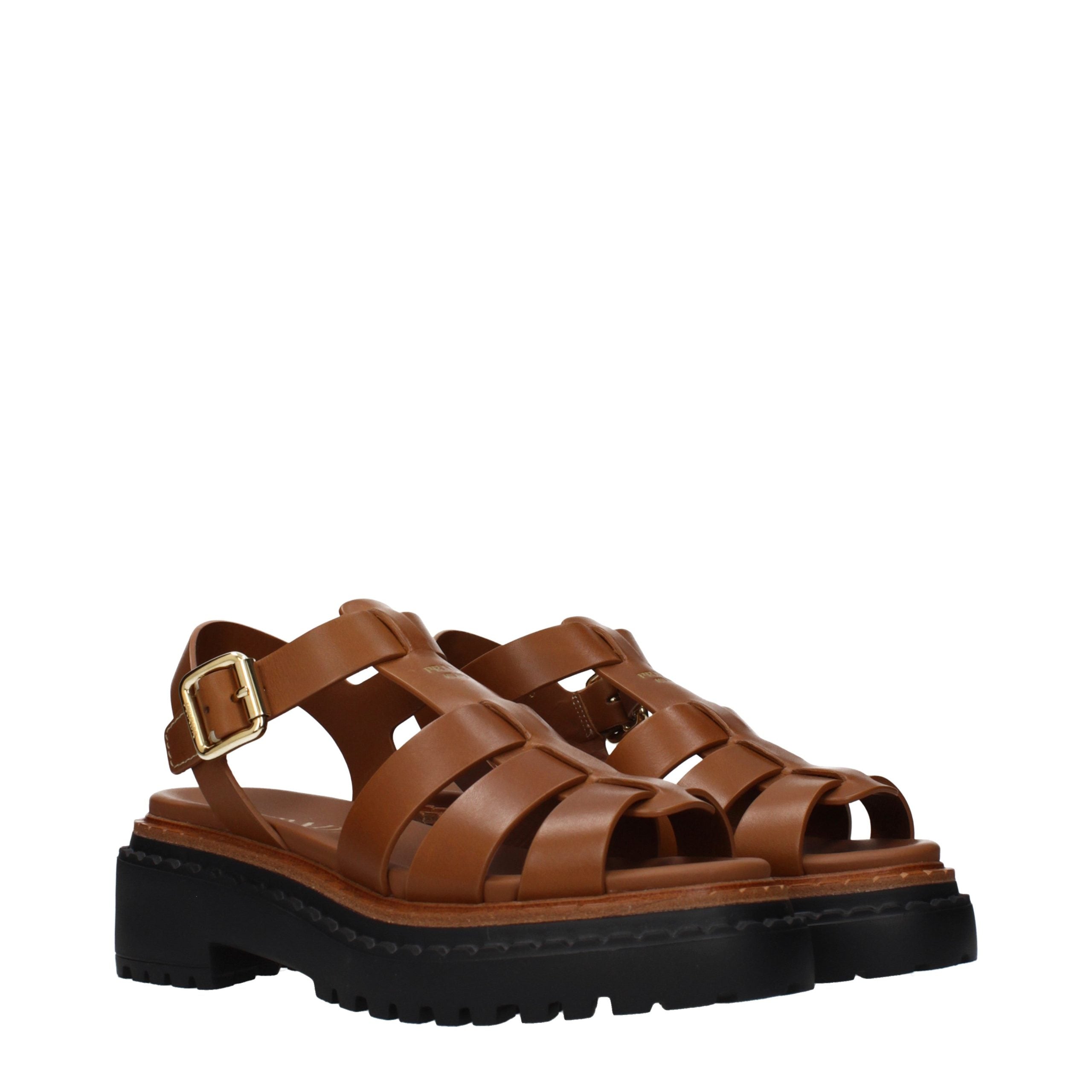 Indulge in the elegance of Prada Brown Leather Platform Sandals, where exquisite Italian craftsmanship meets timeless luxury, perfect for elevating any sophisticated ensemble.
