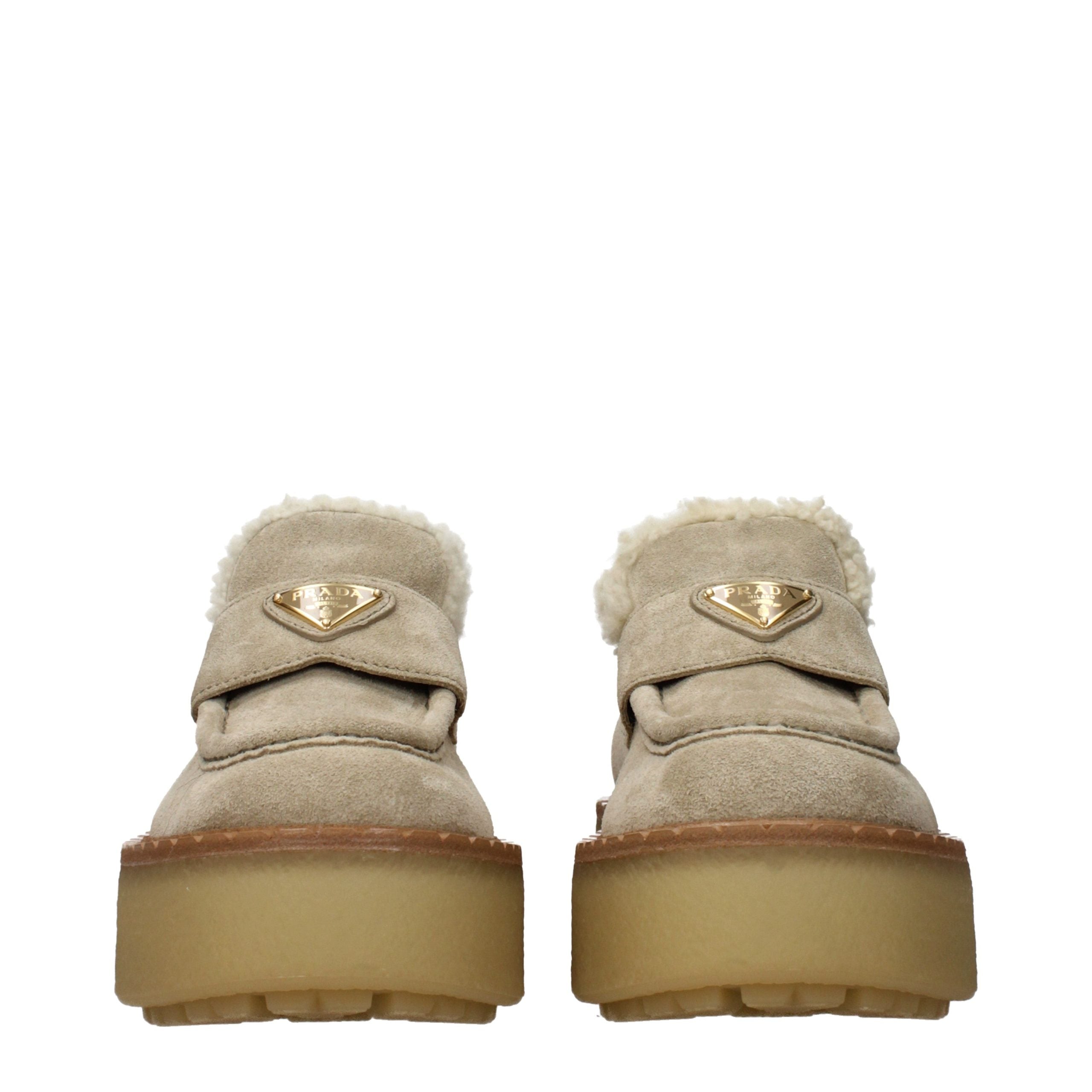 Experience the allure of Prada Beige Leather Platform Loafers, where sumptuous suede meets exquisite craftsmanship, elevating your style with timeless sophistication.