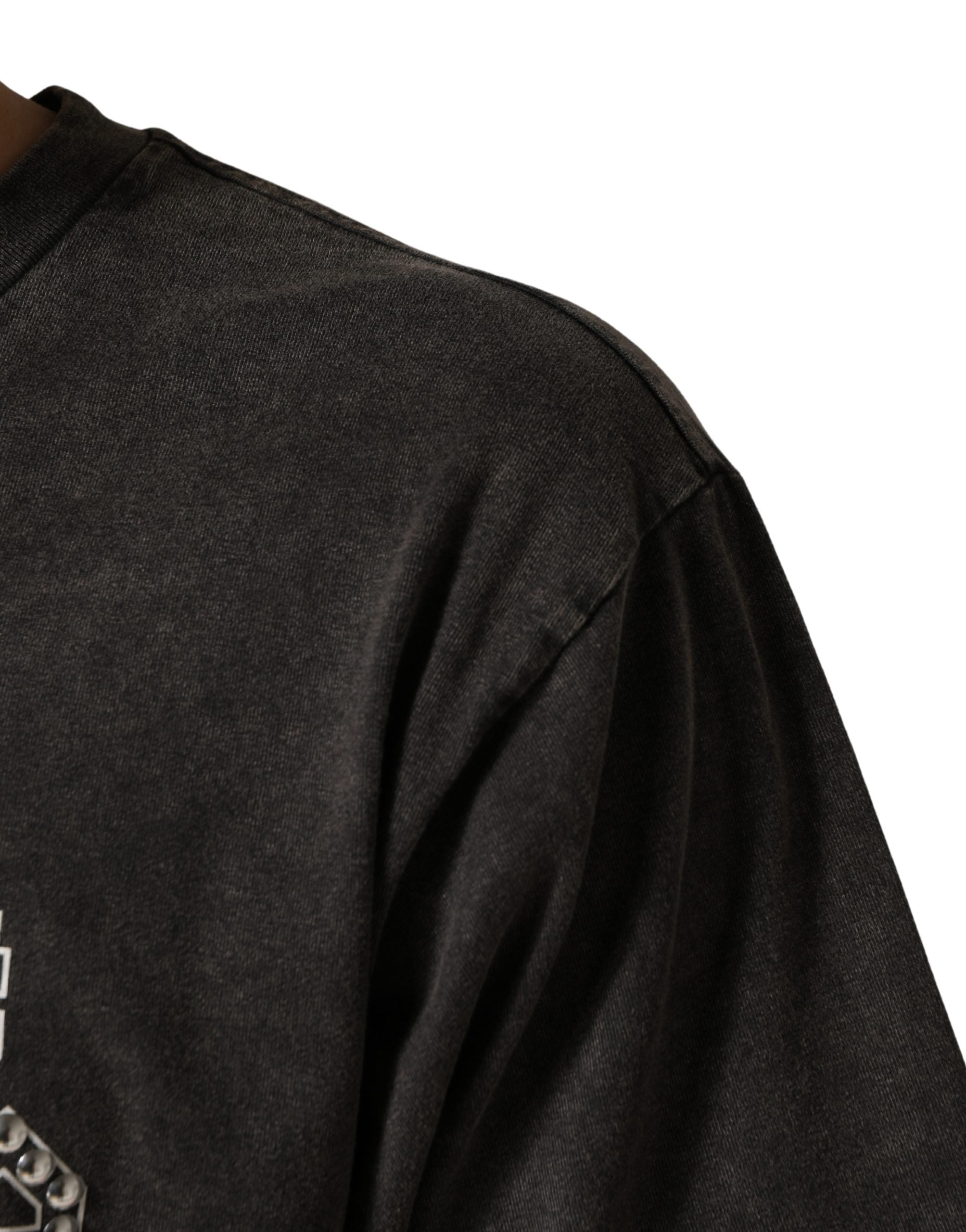 Indulge in the luxurious allure of Dolce & Gabbana's Gray Logo Embellished Crew Neck T-shirt, crafted from exquisite cotton in Italy, embodying timeless sophistication and elegance.