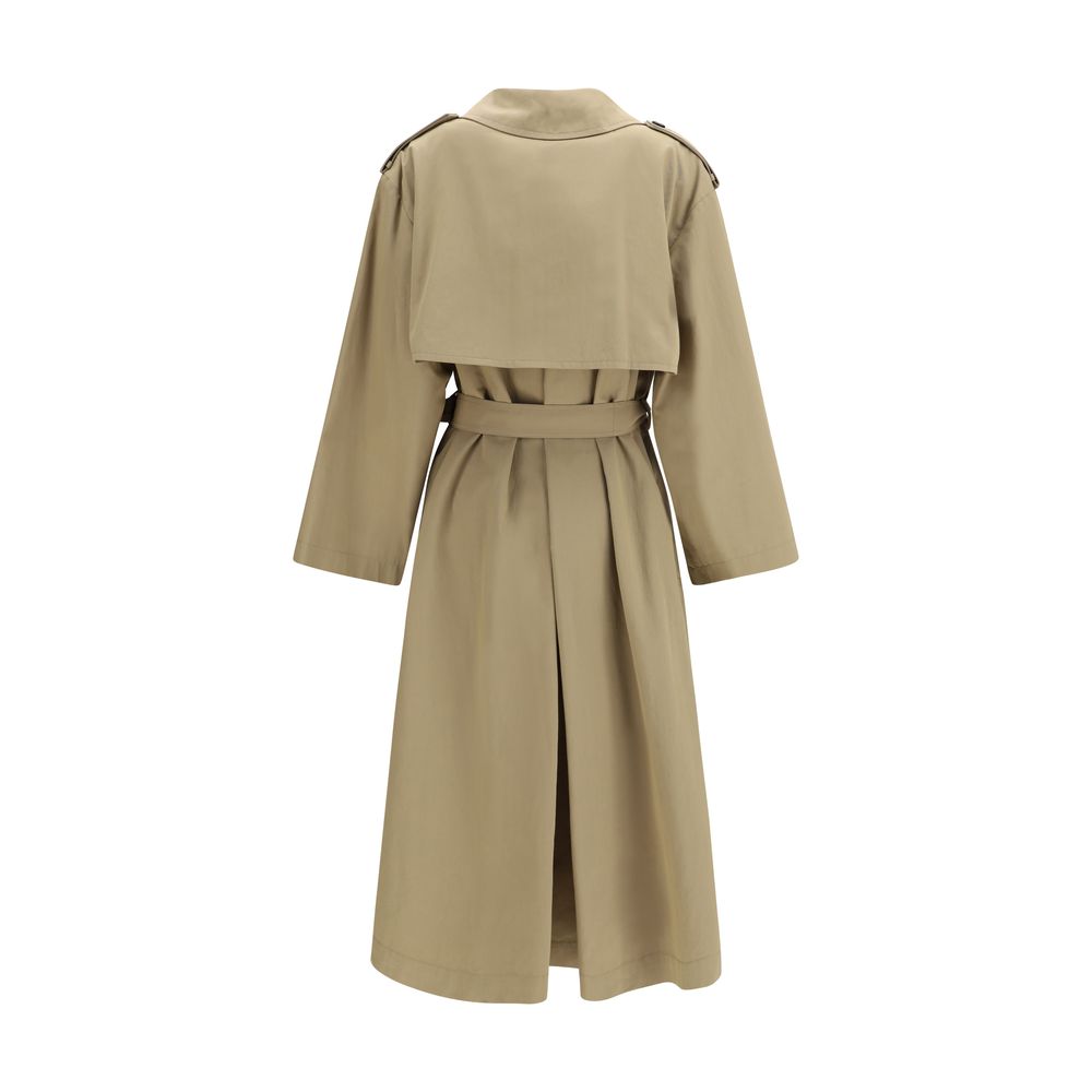 Elevate your wardrobe with the Max Mara Beige Cotton Trench Coat, a luxurious blend of organic cotton and nylon, embodying timeless elegance and exquisite craftsmanship.