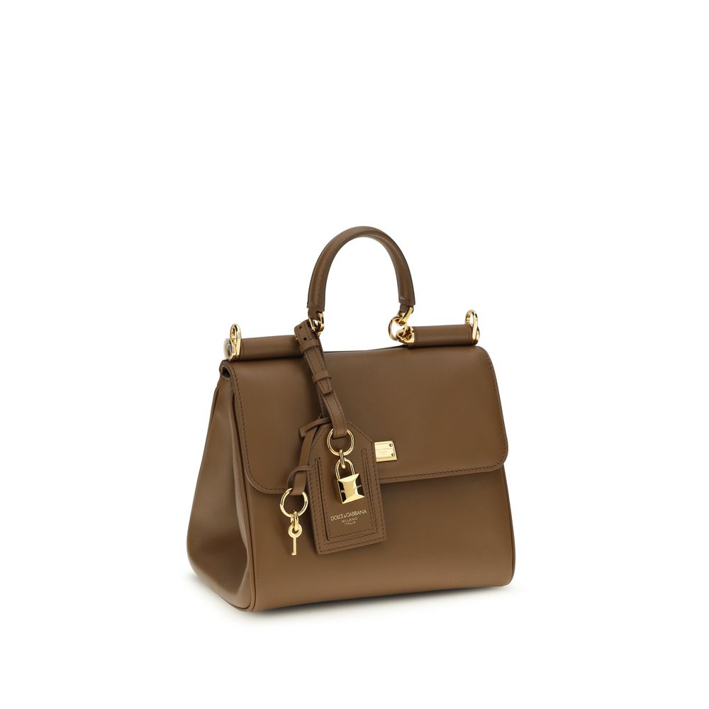 Indulge in the exquisite Dolce & Gabbana Brown Calf Leather Bos Taurus Shoulder Bag, a masterpiece of Italian craftsmanship that elevates every moment with timeless elegance.