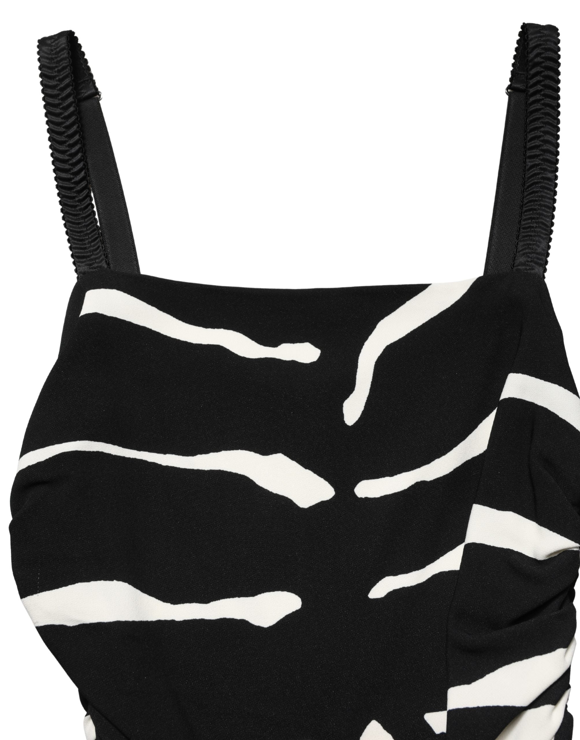 Indulge in the exquisite Dolce & Gabbana Black White Zebra Print Cady Dress, a masterpiece of Italian craftsmanship that embodies timeless elegance for any occasion.