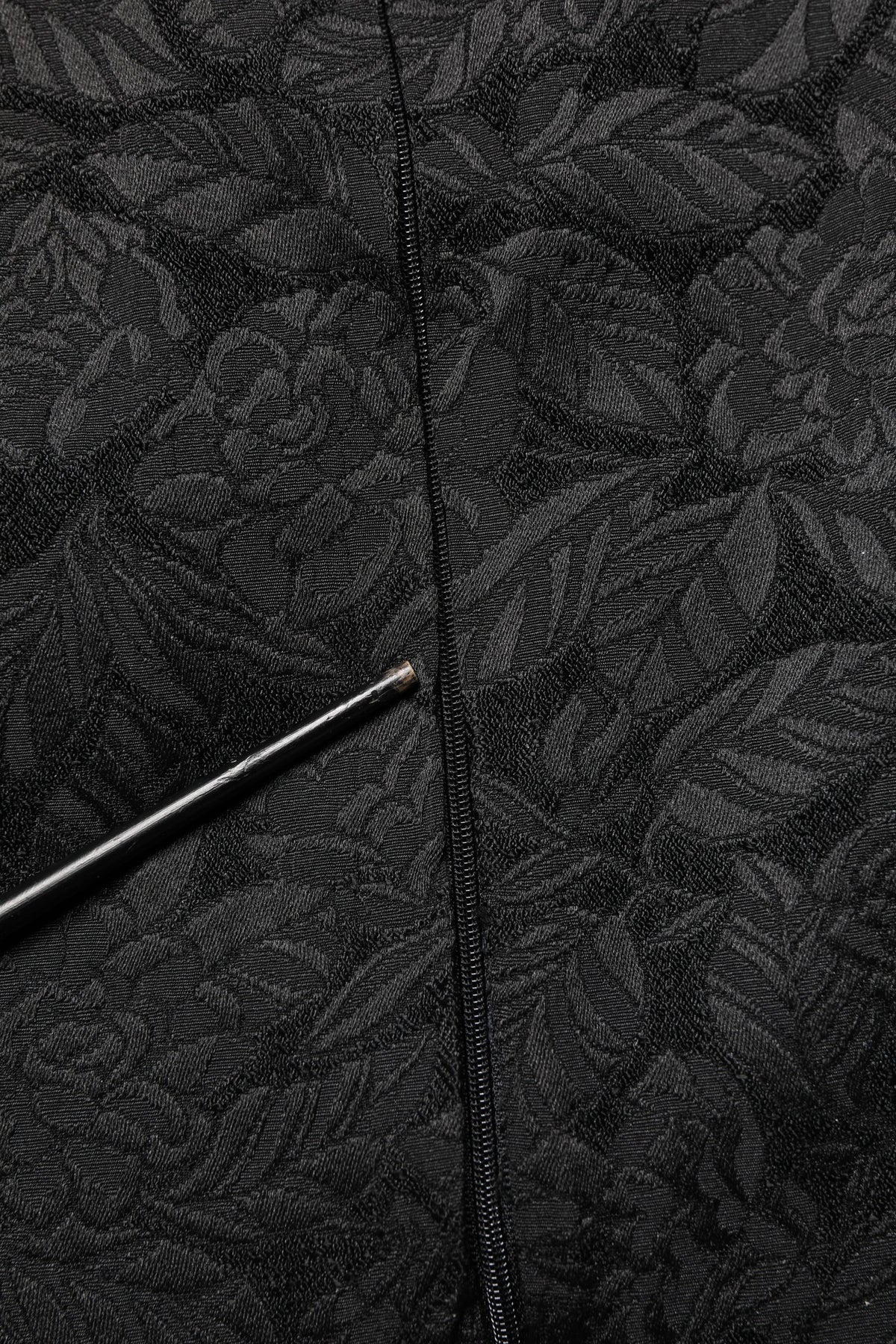 Elevate your wardrobe with the Dolce & Gabbana Black Floral Brocade Sheath Dress, a masterpiece of Italian craftsmanship that embodies timeless elegance and sophistication.