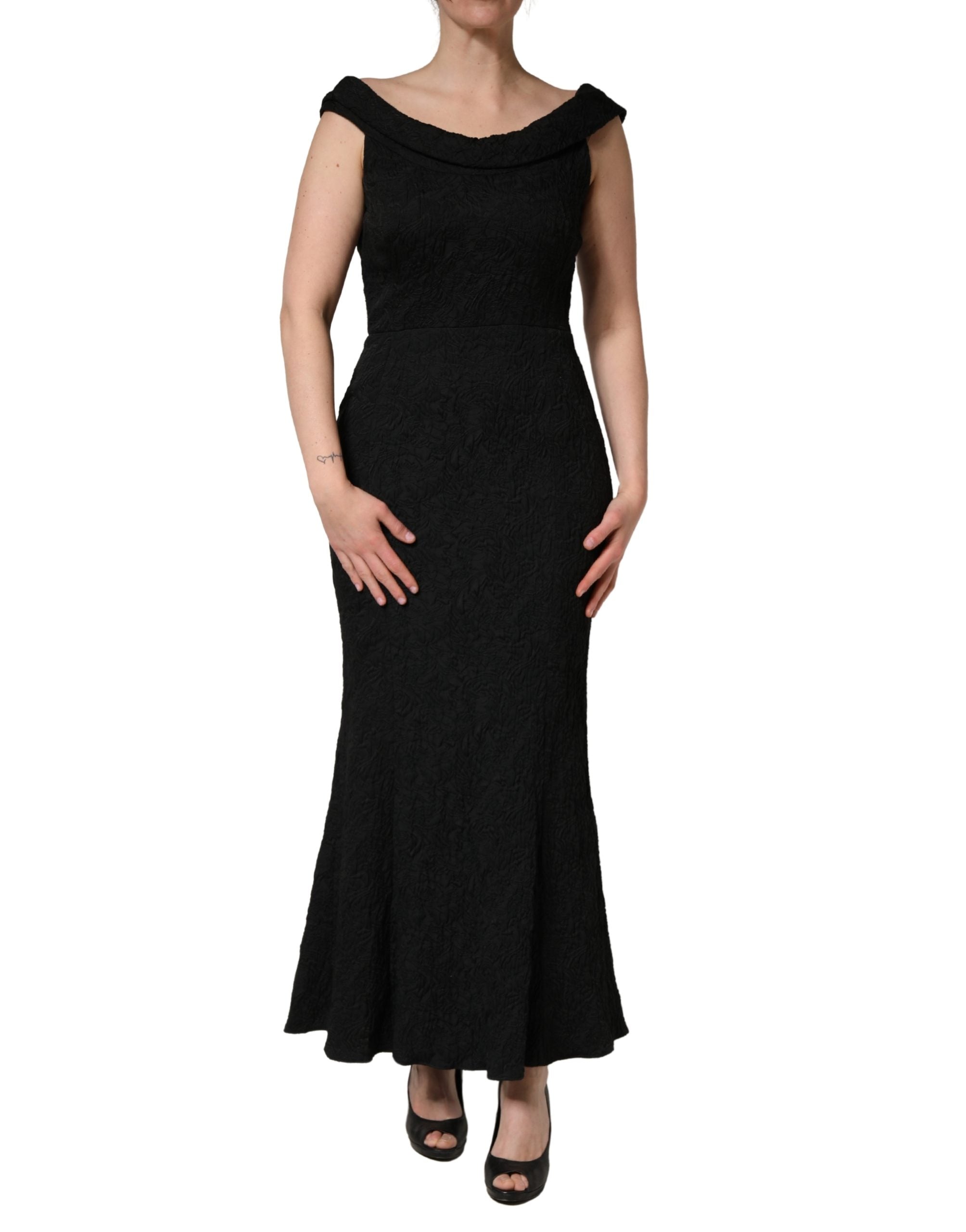 Discover the exquisite Dolce & Gabbana Black Floral Brocade Sheath Mermaid Dress, a testament to Italian artistry, perfect for captivating moments of elegance and allure.