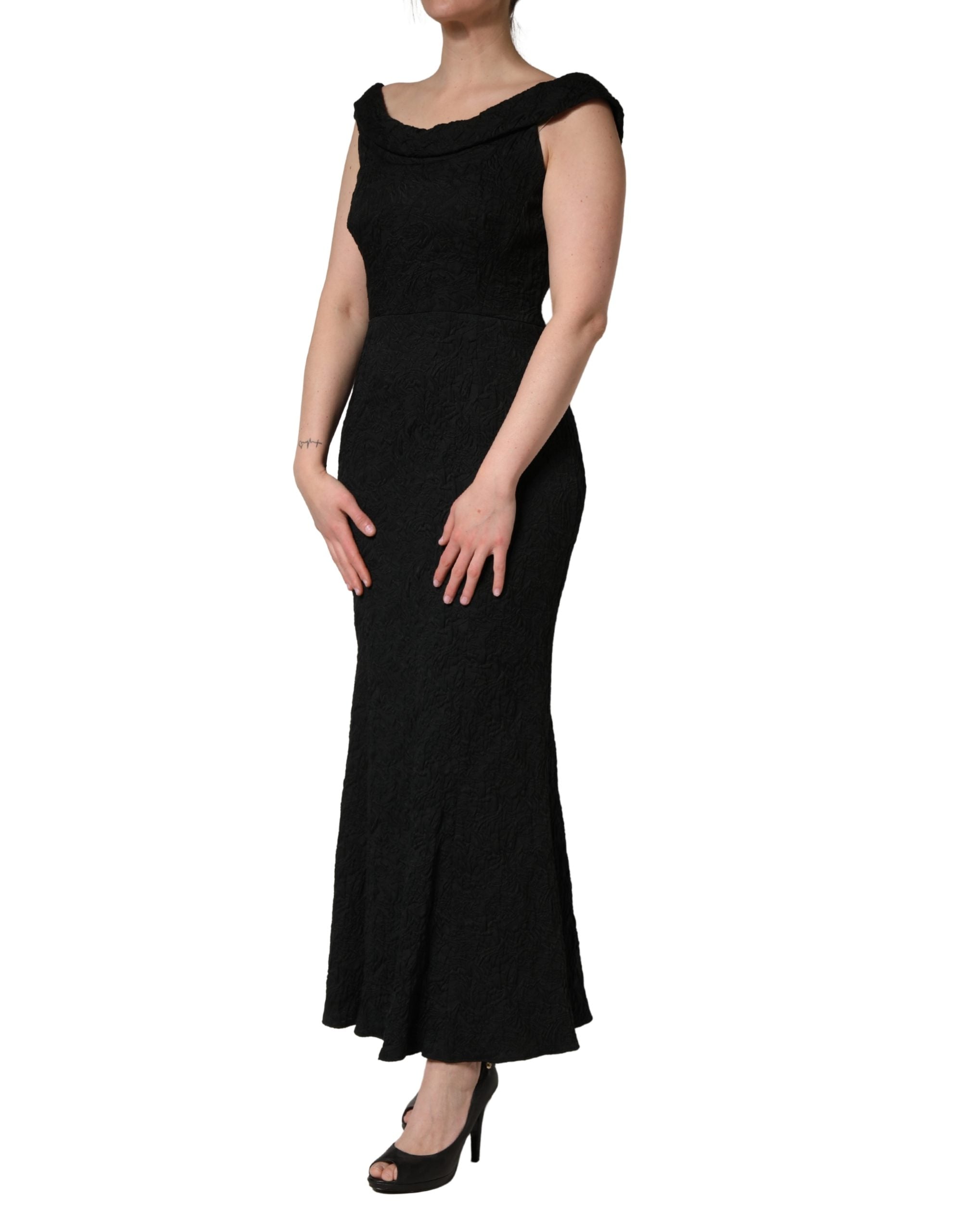 Elevate your elegance with the Dolce & Gabbana Black Floral Brocade Sheath Mermaid Dress, a masterpiece of Italian craftsmanship designed for unforgettable moments.