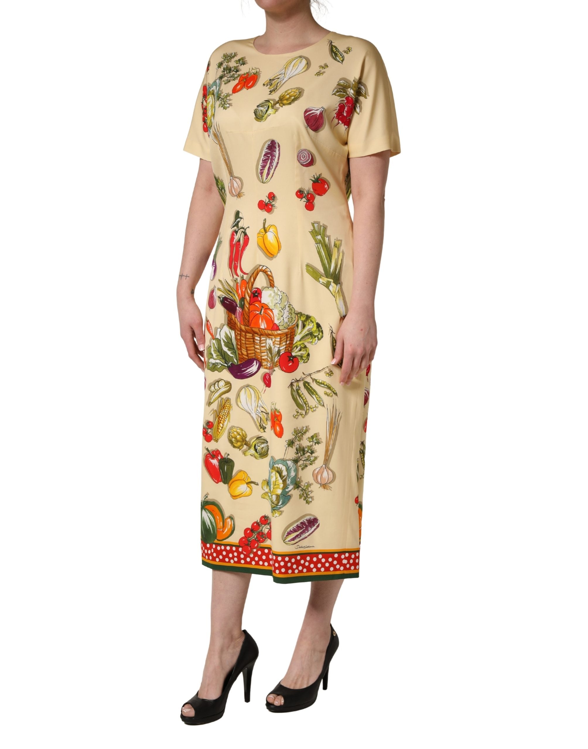 Discover the Dolce & Gabbana Beige Fruit PolkaDot Sheath Silk Midi Dress, a luxurious blend of silk and elastane, embodying Italian craftsmanship for timeless elegance.