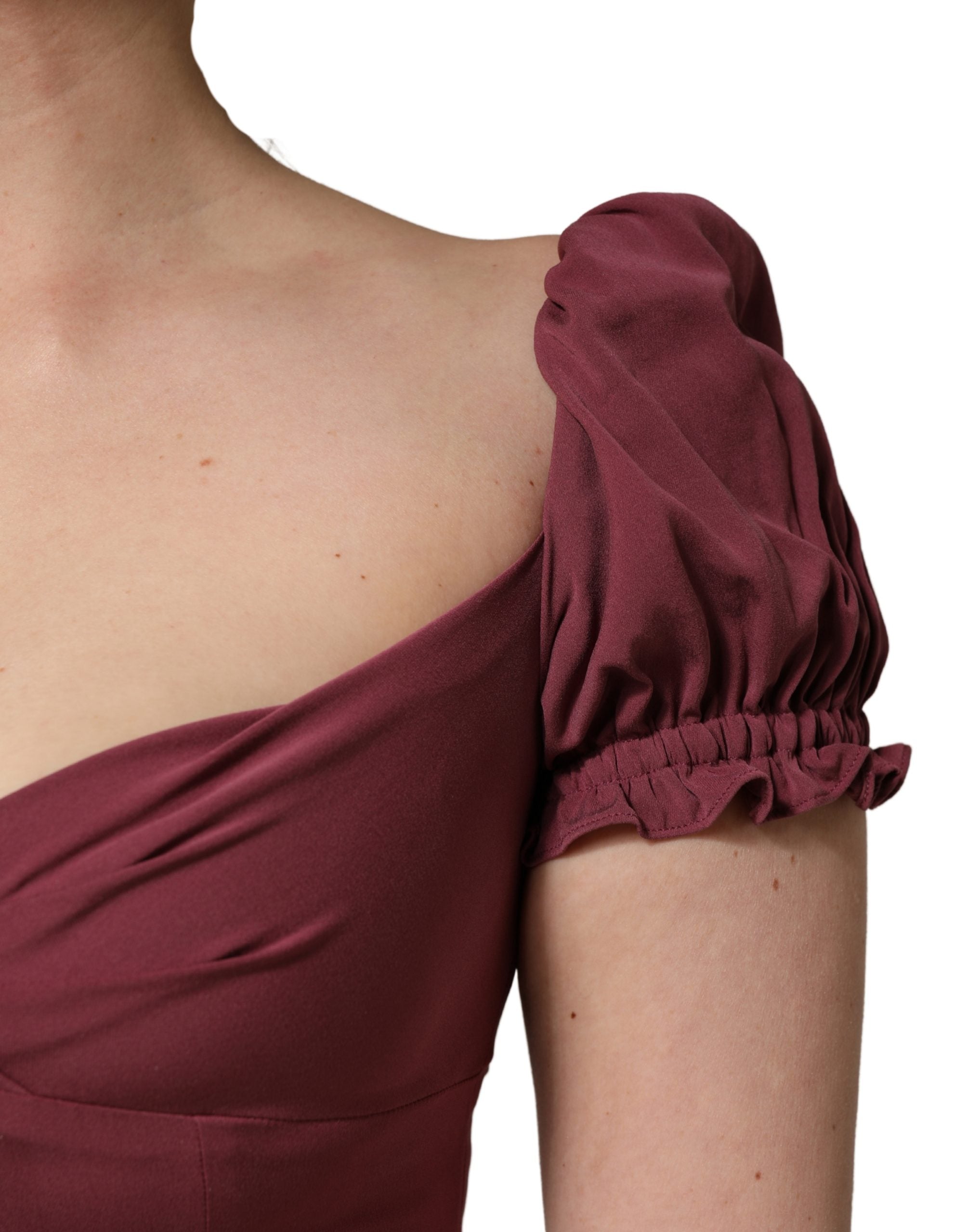Indulge in the exquisite Dolce & Gabbana Maroon Silk Sweetheart Sheath Midi Dress, a timeless embodiment of luxury and Italian craftsmanship, perfect for any sophisticated occasion.