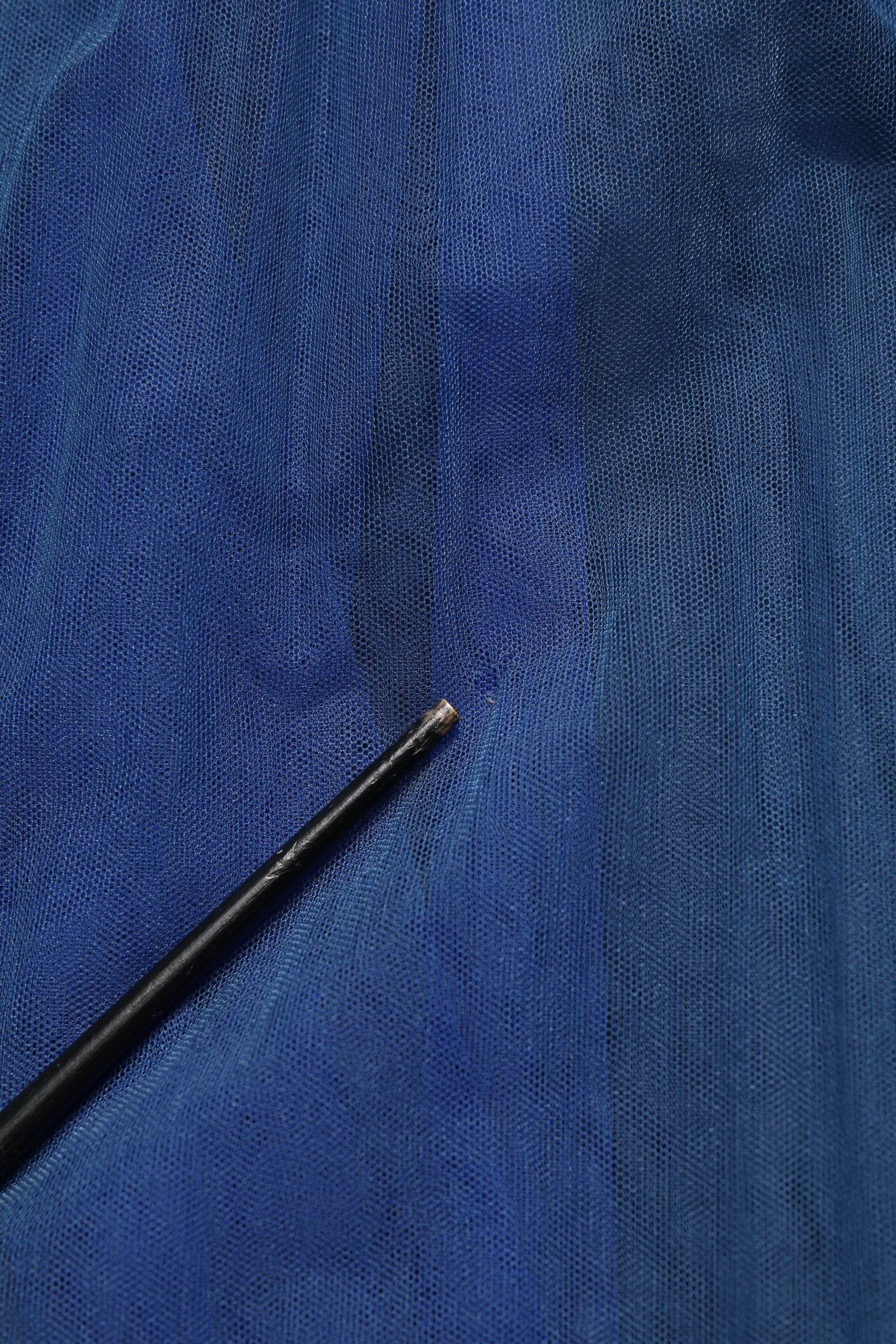 Elevate your wardrobe with the Dolce & Gabbana Blue Tulle Midi A-line Dress, a masterpiece of exquisite craftsmanship and luxurious materials, perfect for any sophisticated occasion.
