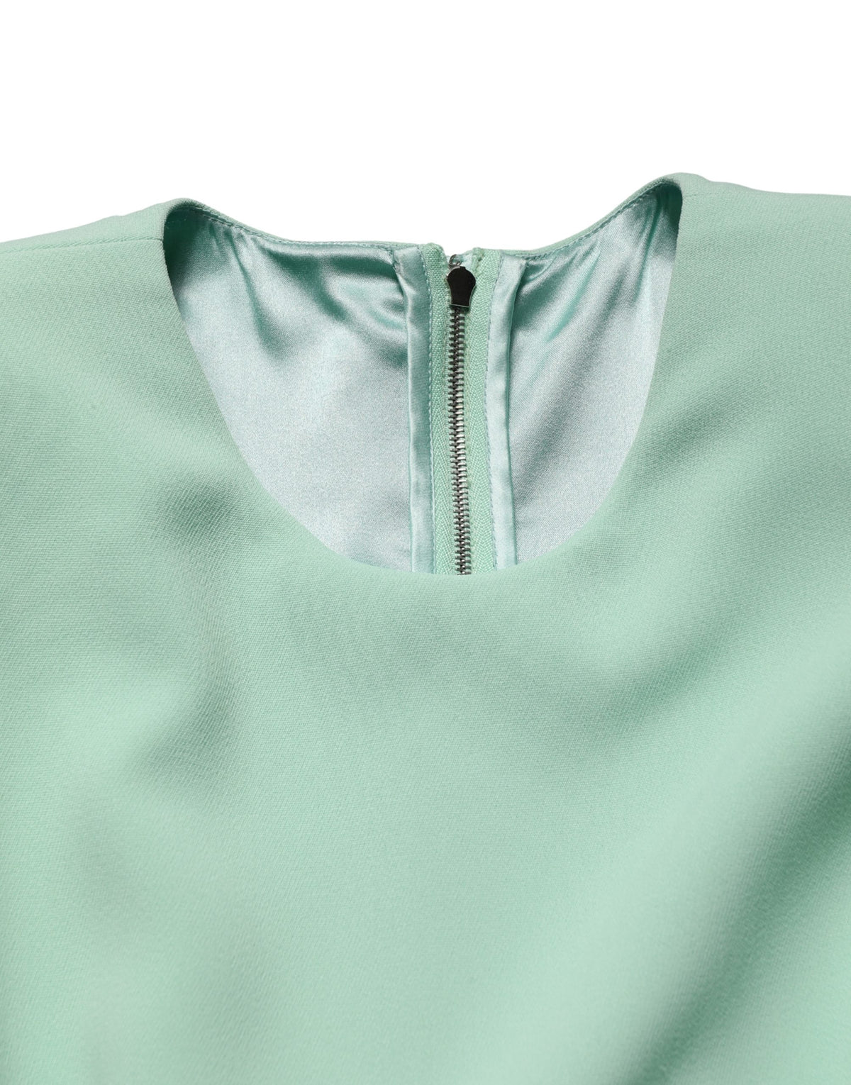 Indulge in the exquisite allure of the Dolce & Gabbana Green Viscose Long Sleeves Gown, a masterpiece of Italian craftsmanship designed for unforgettable moments.