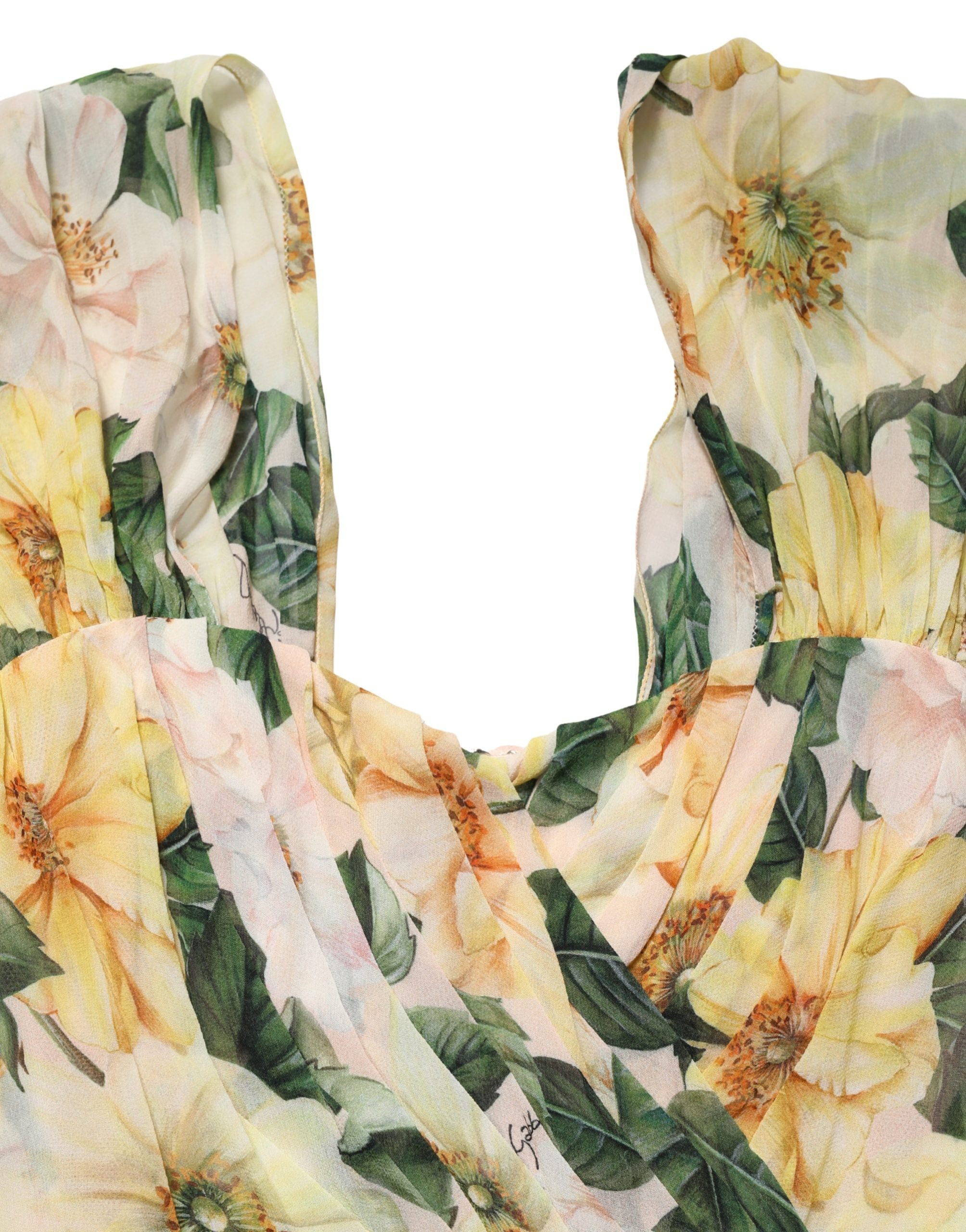 Indulge in the exquisite allure of the Dolce & Gabbana Yellow Silk Floral Print Pleated Maxi Dress, a masterpiece of Italian craftsmanship that elevates every occasion with its luxurious elegance.