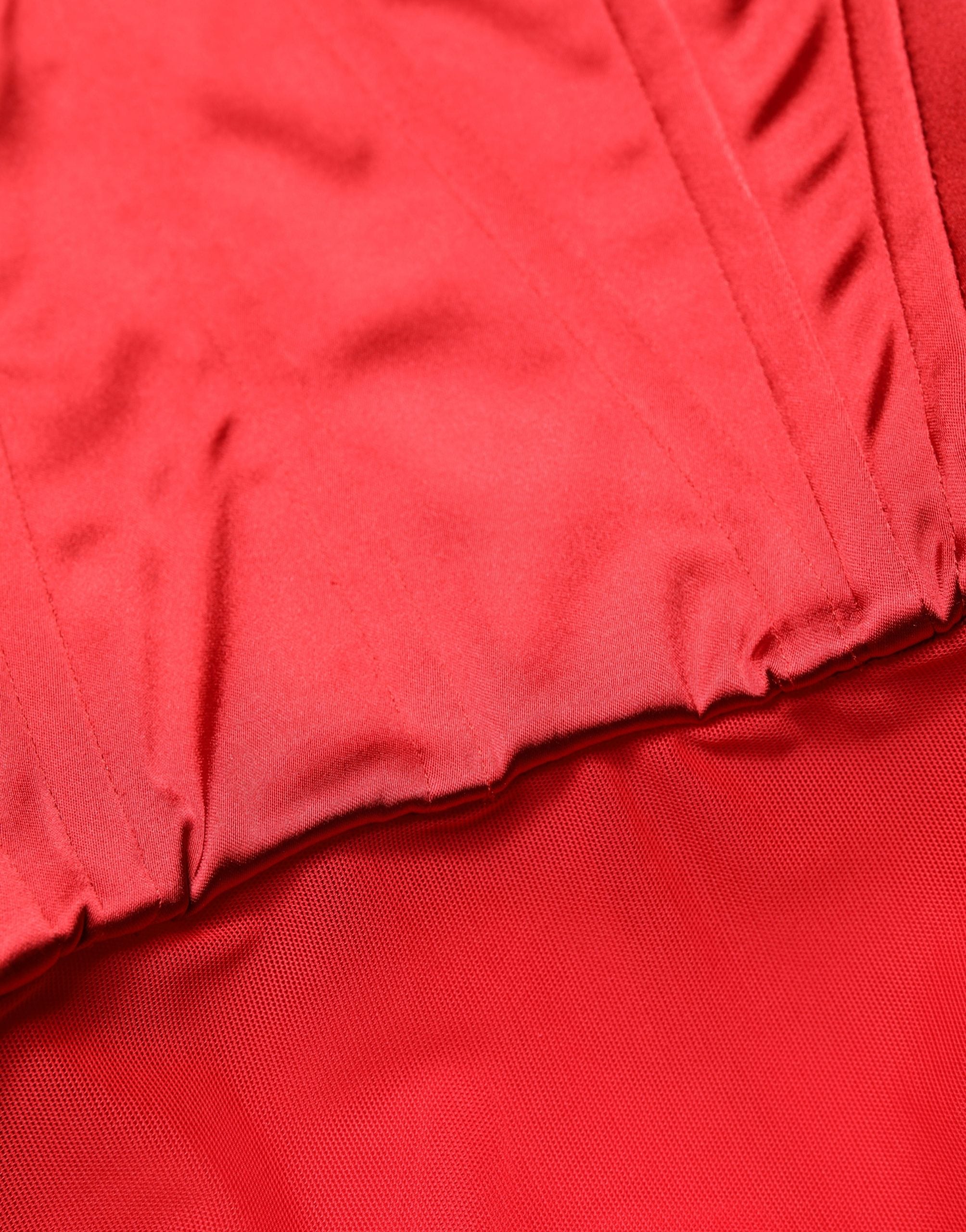 Indulge in the exquisite Dolce & Gabbana Red Halter Corset Sleeveless Sheath Dress, a masterpiece of Italian craftsmanship that embodies luxury and elegance for unforgettable moments.