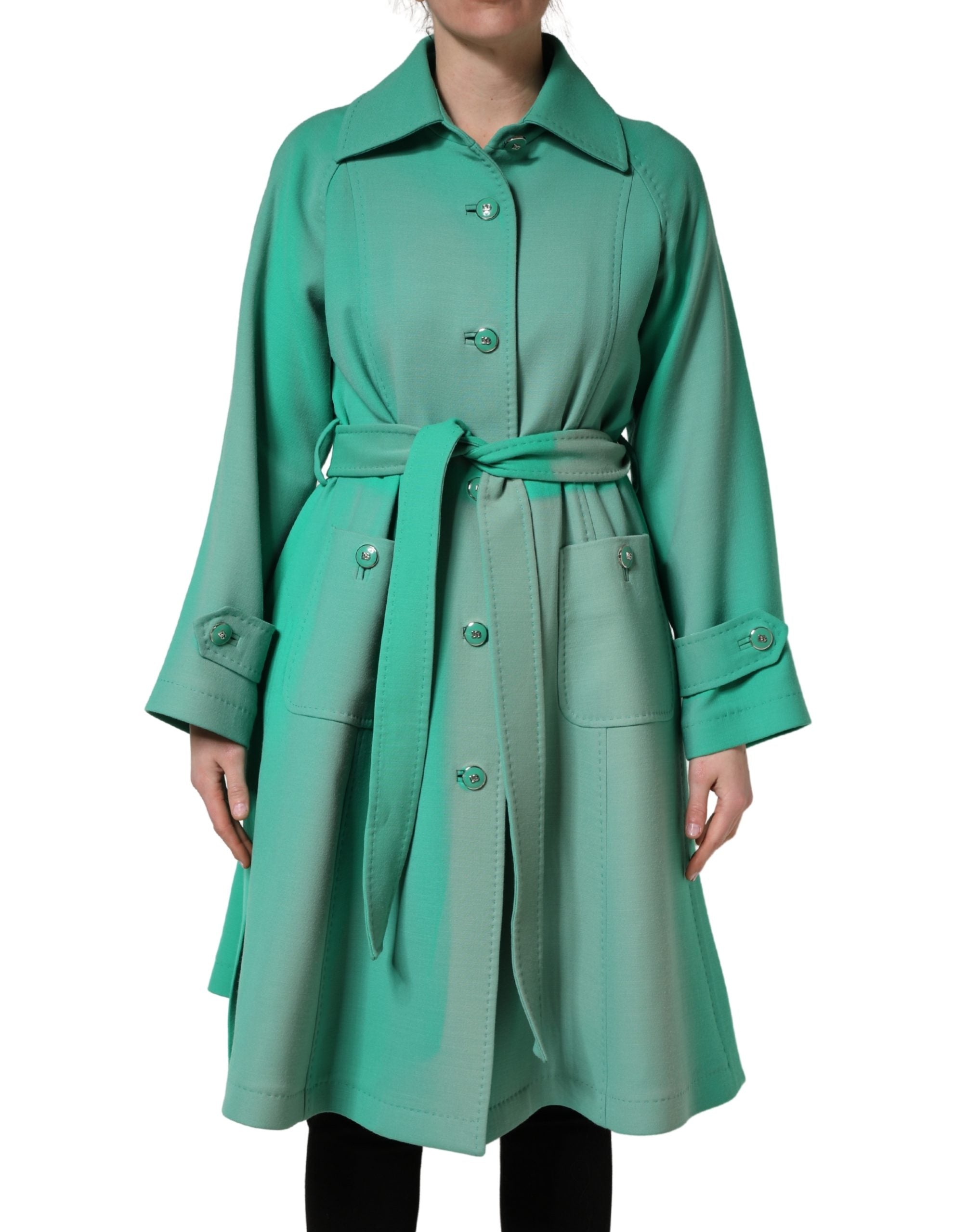 Experience the allure of the Dolce & Gabbana Green Buttoned Down Belt Trench Coat, crafted from luxurious virgin wool, embodying timeless elegance and exquisite Italian craftsmanship.