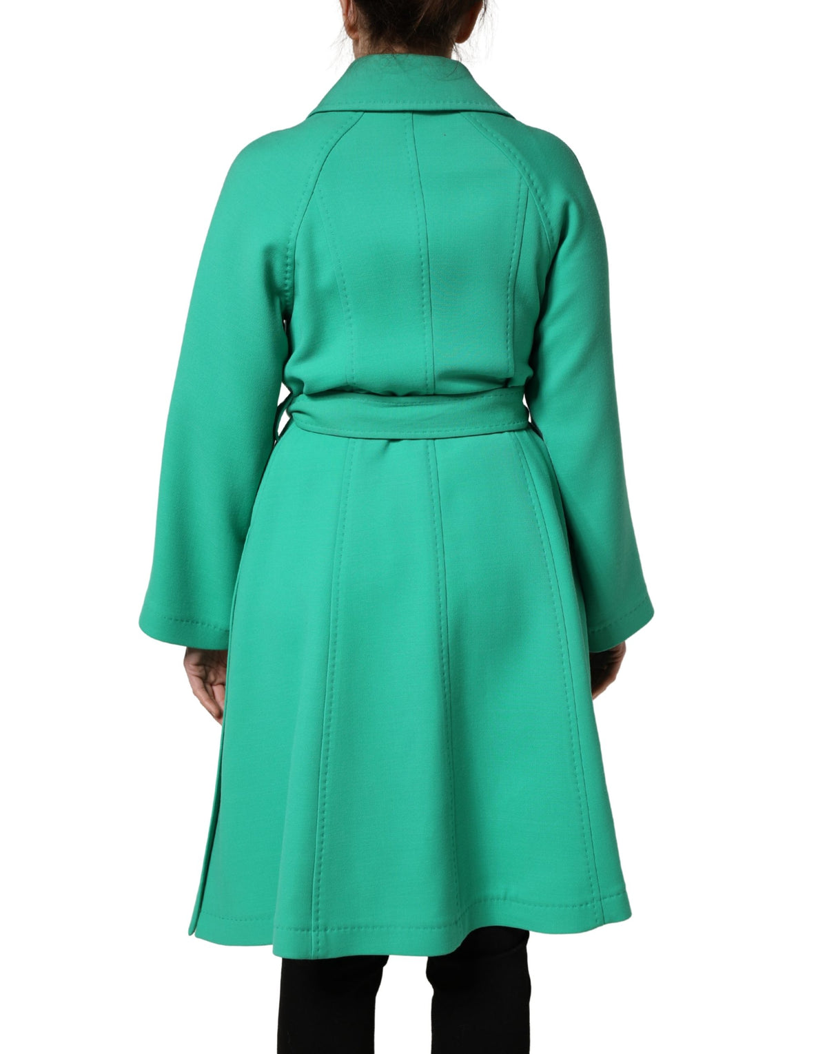 Experience the allure of the Dolce & Gabbana Green Buttoned Down Belt Trench Coat, crafted from 100% virgin wool, embodying timeless elegance and exquisite Italian craftsmanship.