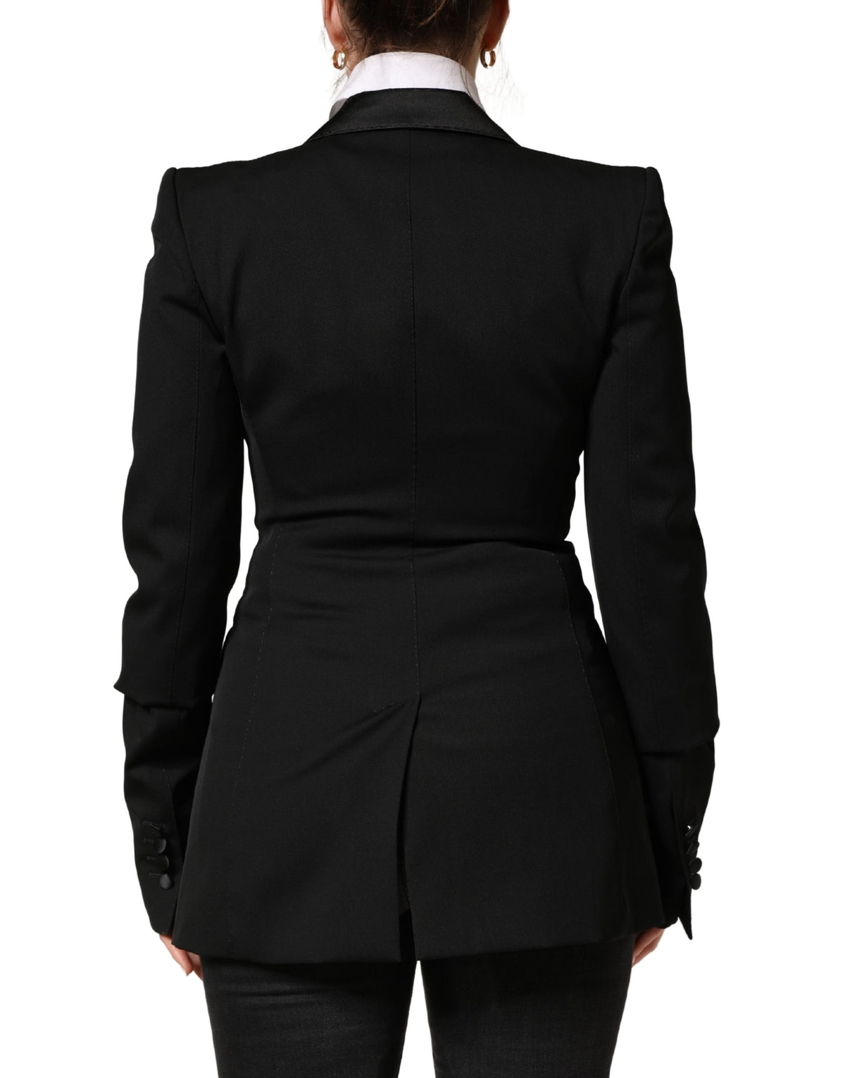 Elevate your wardrobe with the Dolce & Gabbana Black Wool Single Breasted Blazer, a masterpiece of Italian craftsmanship that exudes timeless sophistication and luxury.