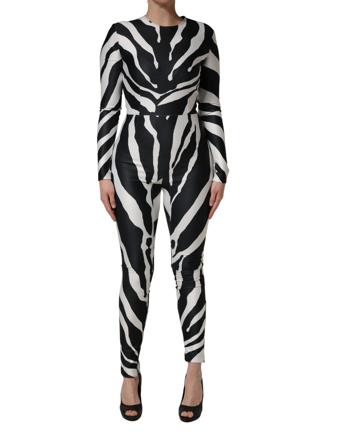 Elevate your wardrobe with the Dolce & Gabbana Black White Zebra Pattern Jumpsuit, a masterpiece of Italian craftsmanship that embodies luxury and bold elegance.