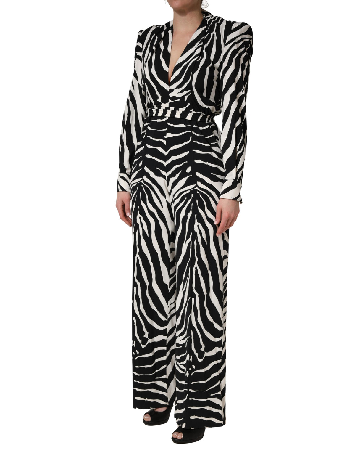 Indulge in the exquisite Dolce & Gabbana Black White Viscose Zebra Pattern Jumpsuit, a luxurious blend of artistry and craftsmanship, perfect for those who embrace elegance and sophistication.