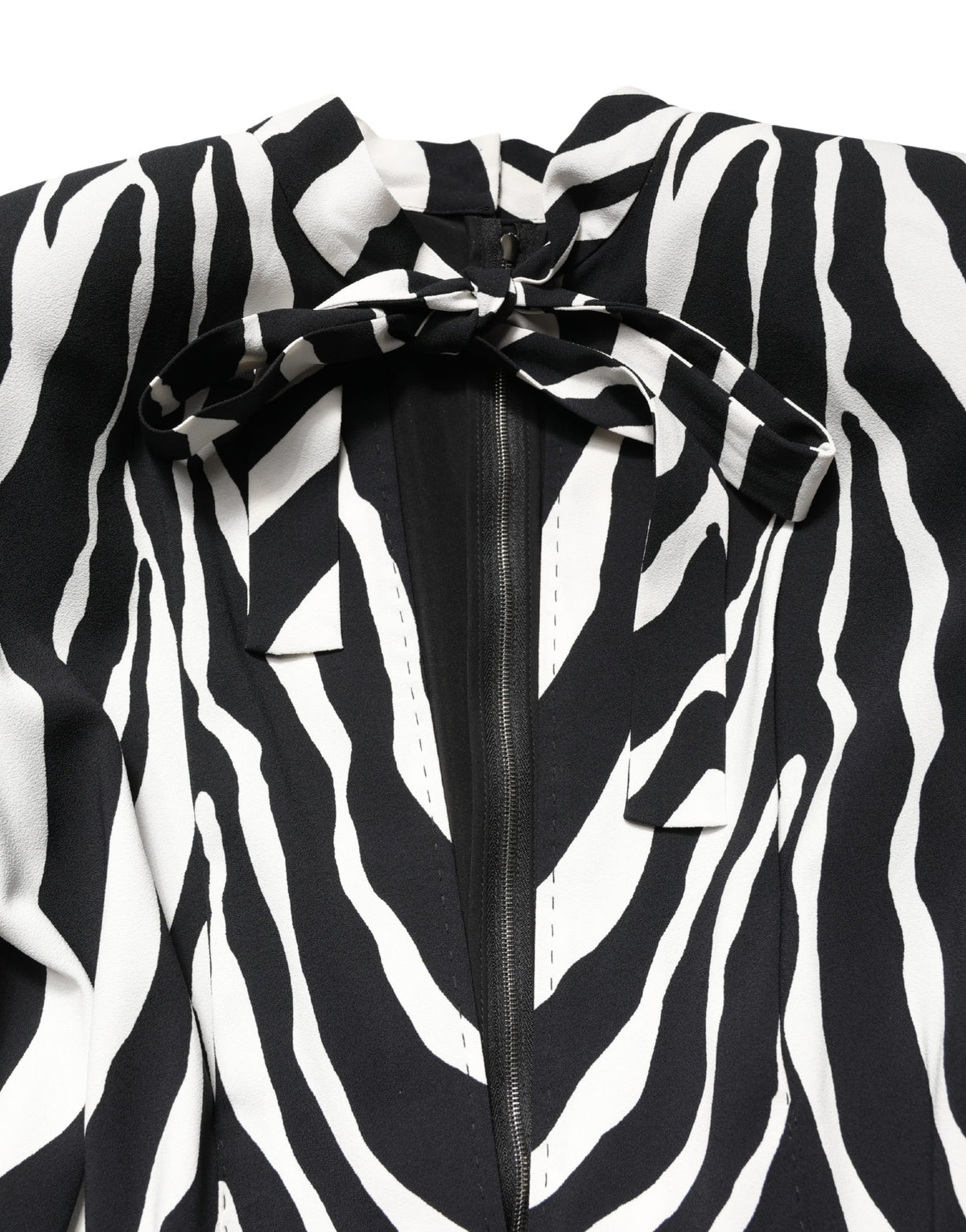 Discover the exquisite Dolce & Gabbana Black White Viscose Zebra Pattern Jumpsuit, a masterpiece of luxurious craftsmanship, perfect for those who embody elegance and boldness.