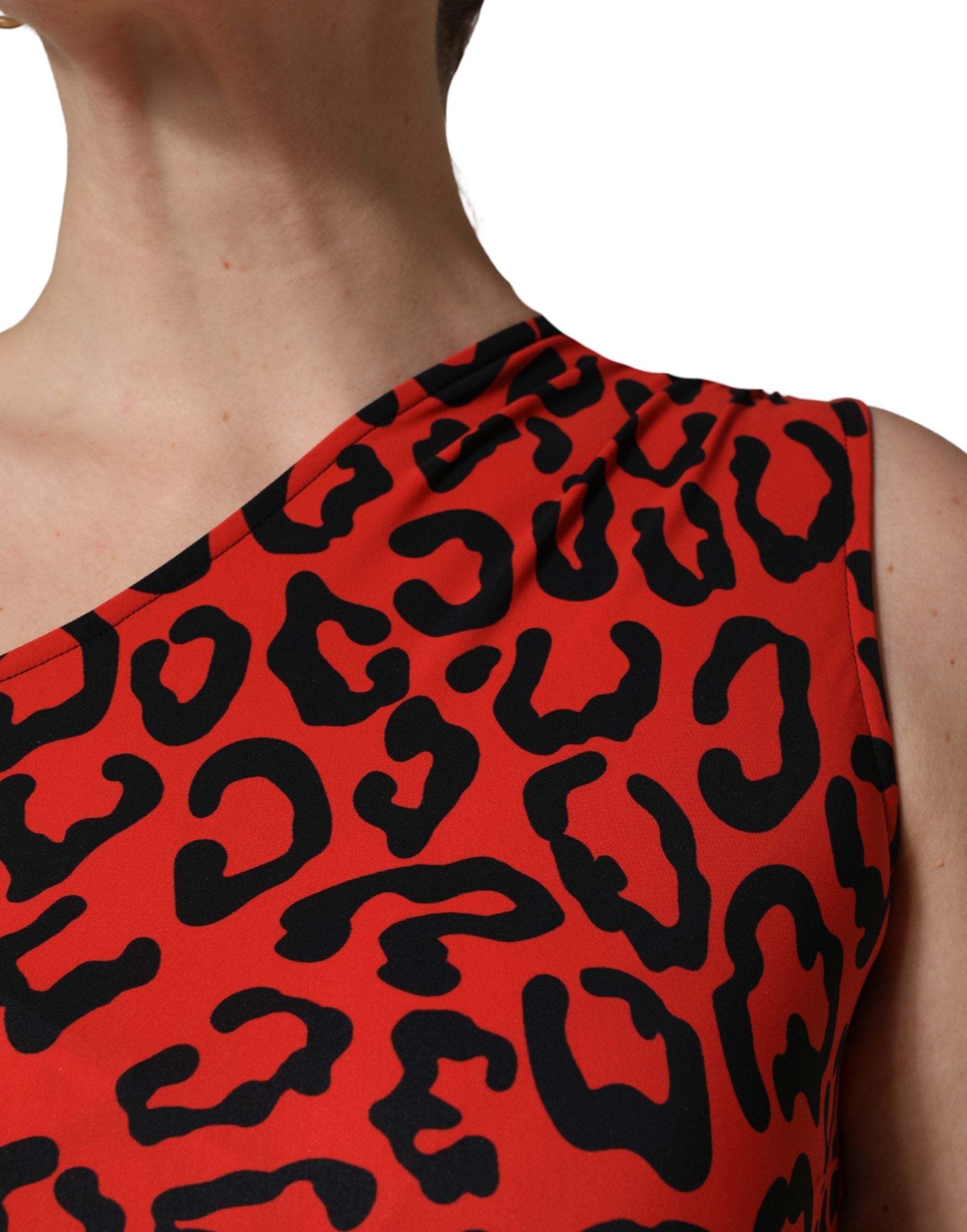 Elevate your wardrobe with the Dolce & Gabbana Black Red Nylon Leopard Pattern Jumpsuit, a masterpiece of Italian craftsmanship that exudes bold sophistication and timeless allure.