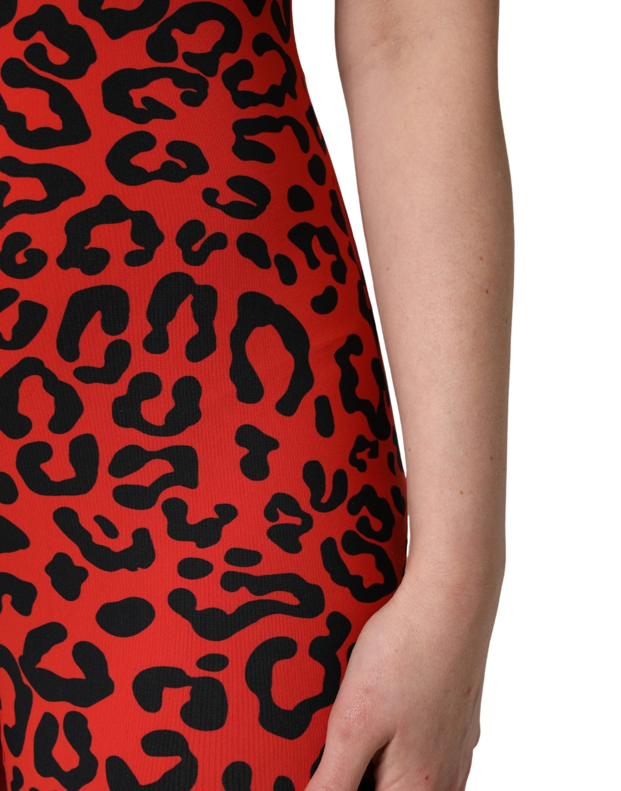 Elevate your wardrobe with the Dolce & Gabbana Black Red Nylon Leopard Pattern Jumpsuit, a luxurious embodiment of Italian craftsmanship and bold sophistication.