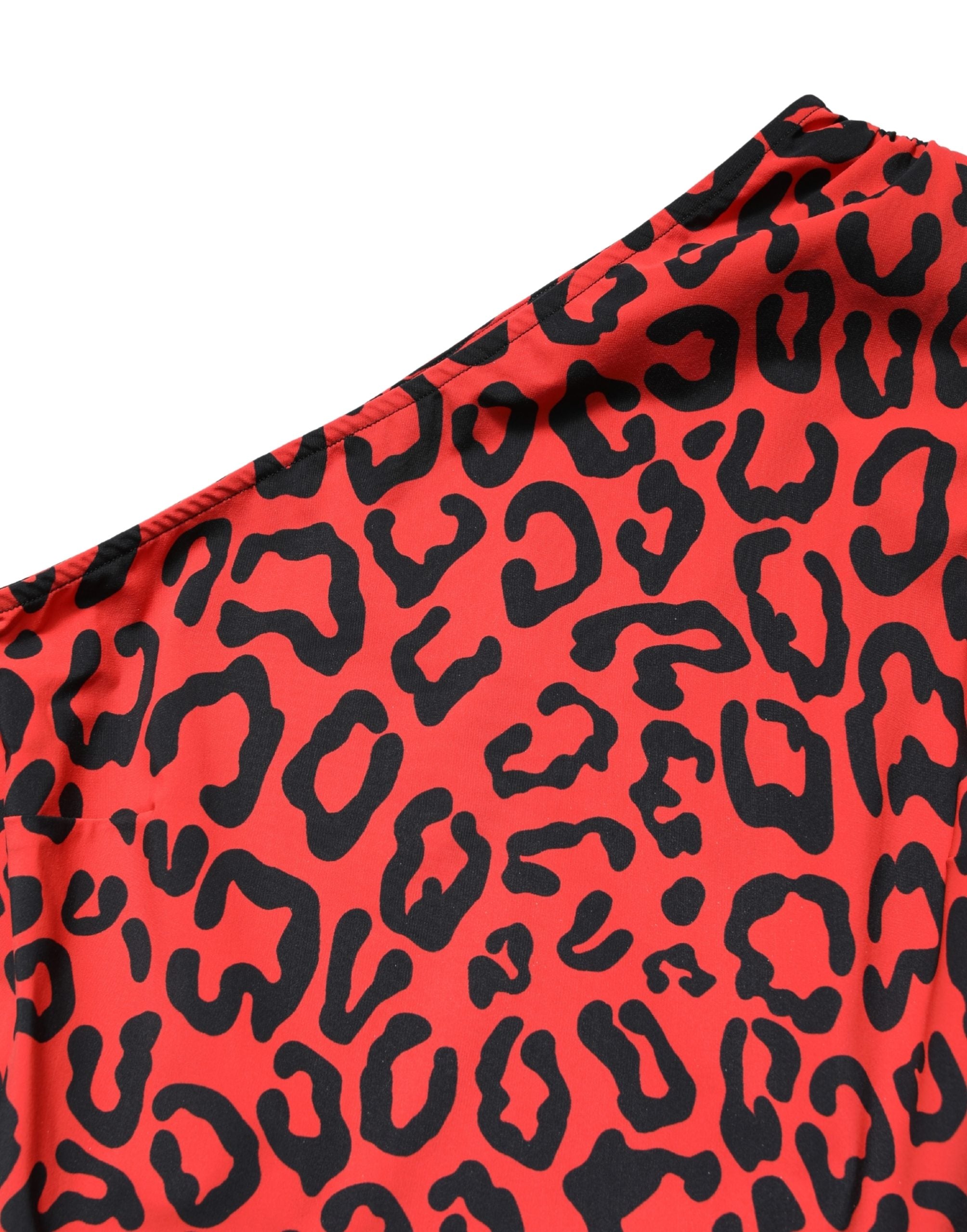 Elevate your wardrobe with the Dolce & Gabbana Black Red Nylon Leopard Pattern Jumpsuit, a masterpiece of Italian craftsmanship that exudes bold sophistication and timeless allure.