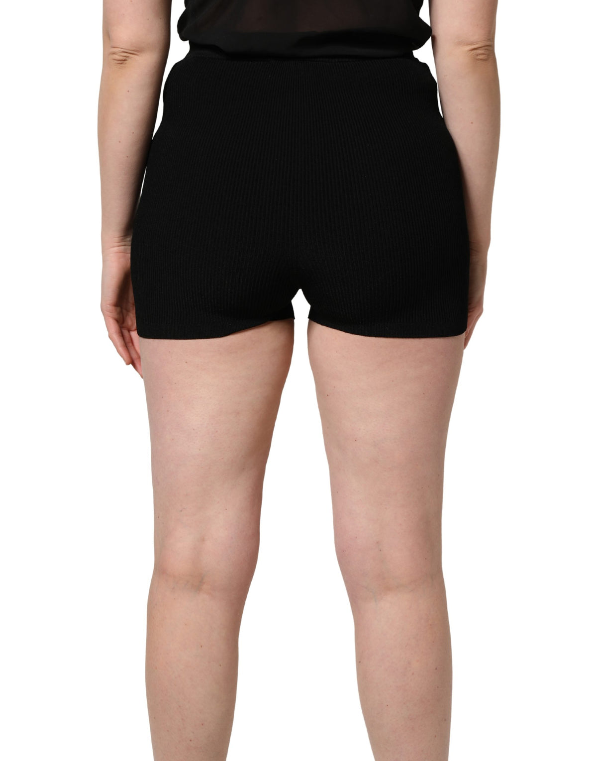 Experience the allure of Dolce & Gabbana's Black Viscose High Waisted Hot Pants, a masterpiece of Italian craftsmanship that redefines luxury and sophistication.