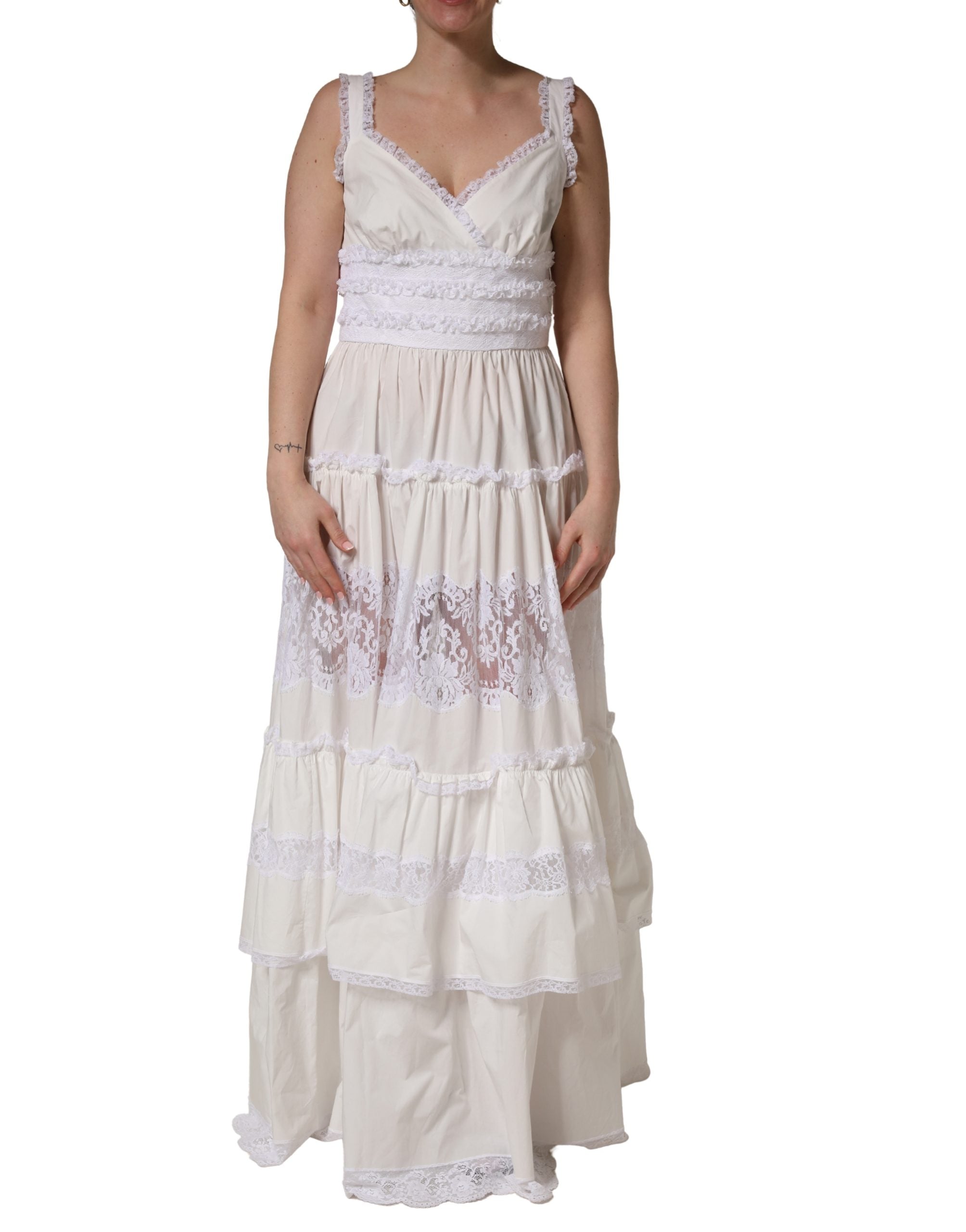 Elevate your elegance with Dolce & Gabbana's White Cotton Sleeveless Lace Maxi Dress, a luxurious blend of refined craftsmanship and timeless allure, perfect for sophisticated occasions.