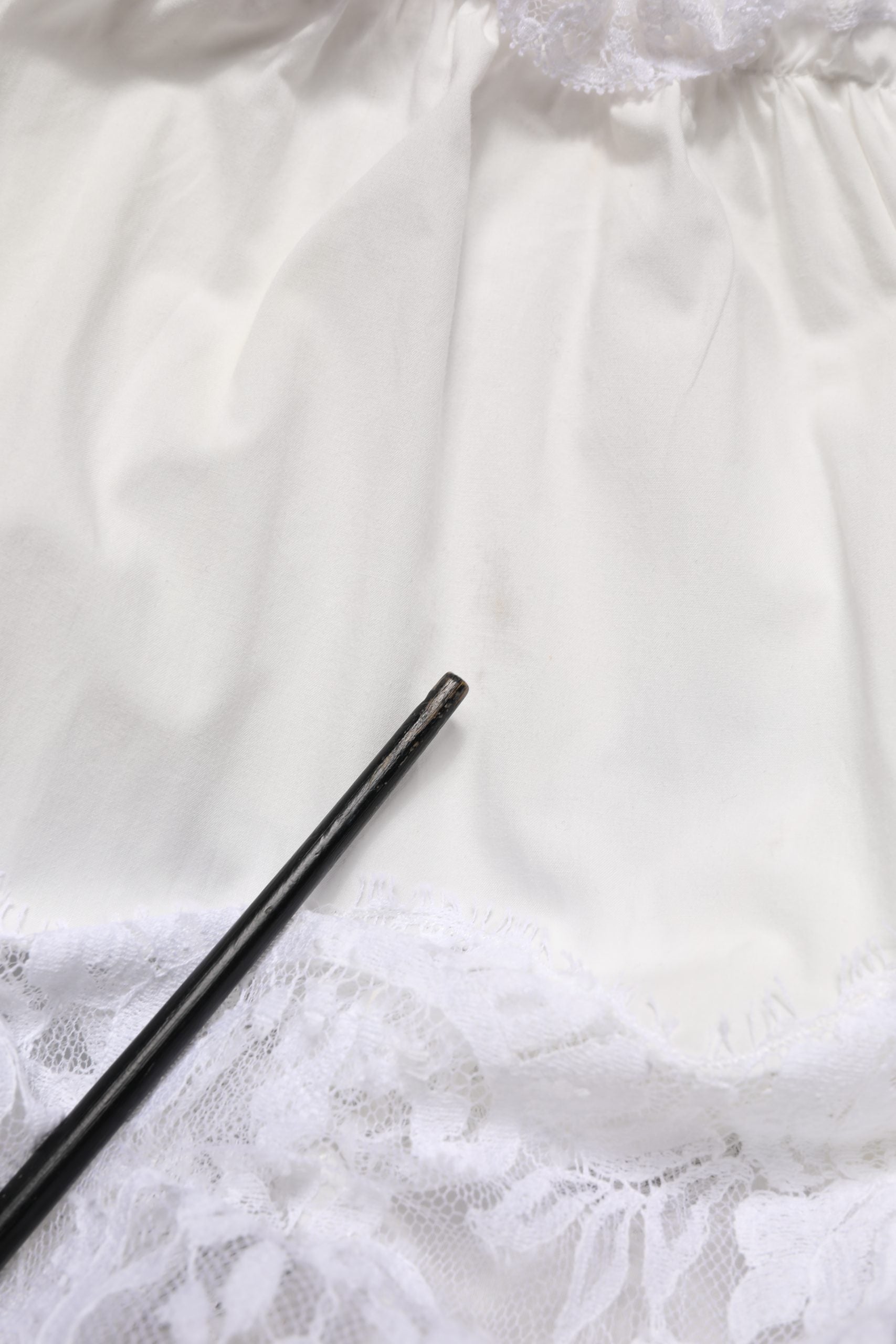 Elevate your wardrobe with the Dolce & Gabbana White Cotton Sleeveless Lace Maxi Dress, a luxurious blend of silk and cotton, embodying timeless elegance for sophisticated occasions.