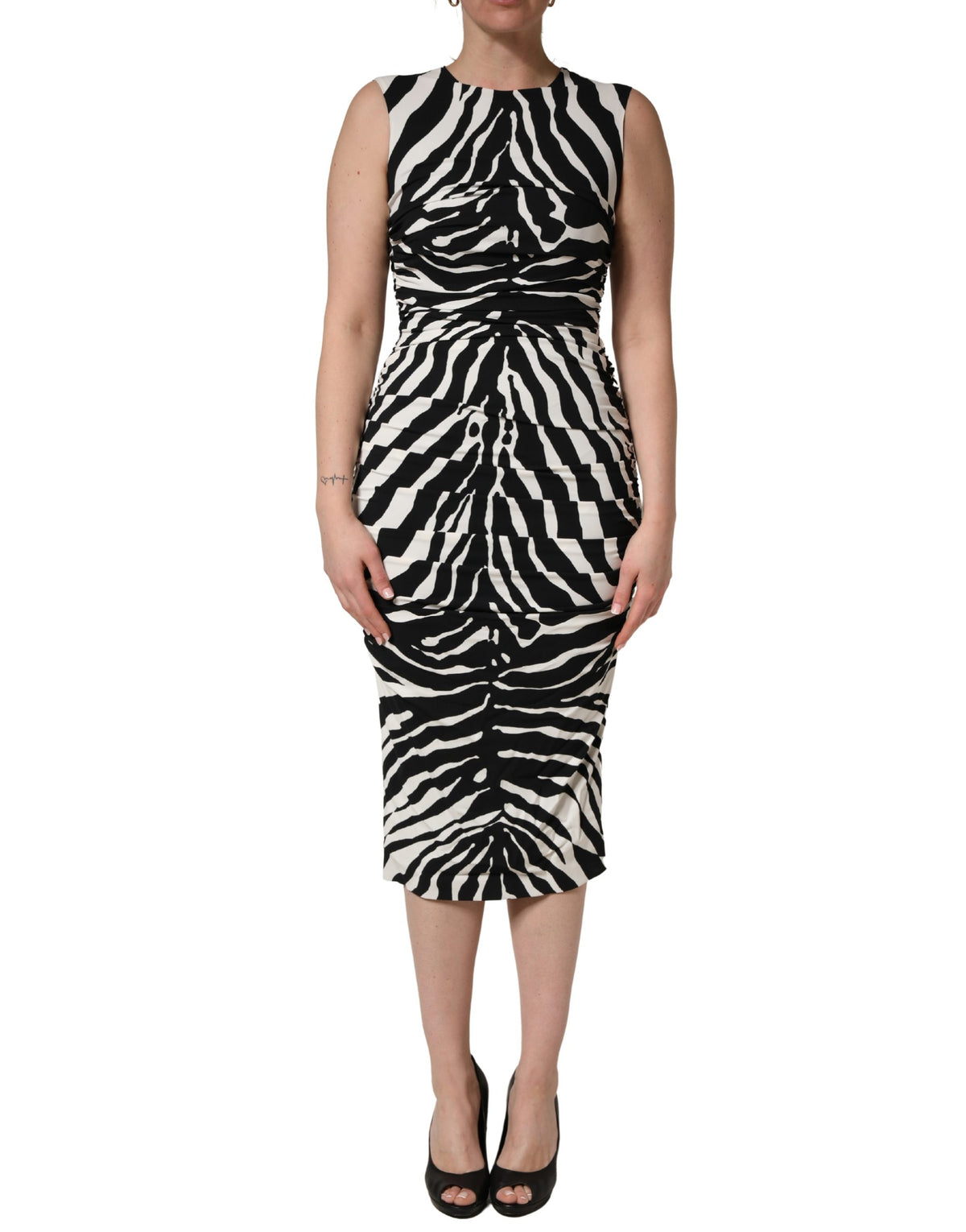 Indulge in the exquisite allure of the Dolce & Gabbana Black White Zebra Cady Calf Length Dress, where luxurious craftsmanship meets timeless elegance for unforgettable moments.
