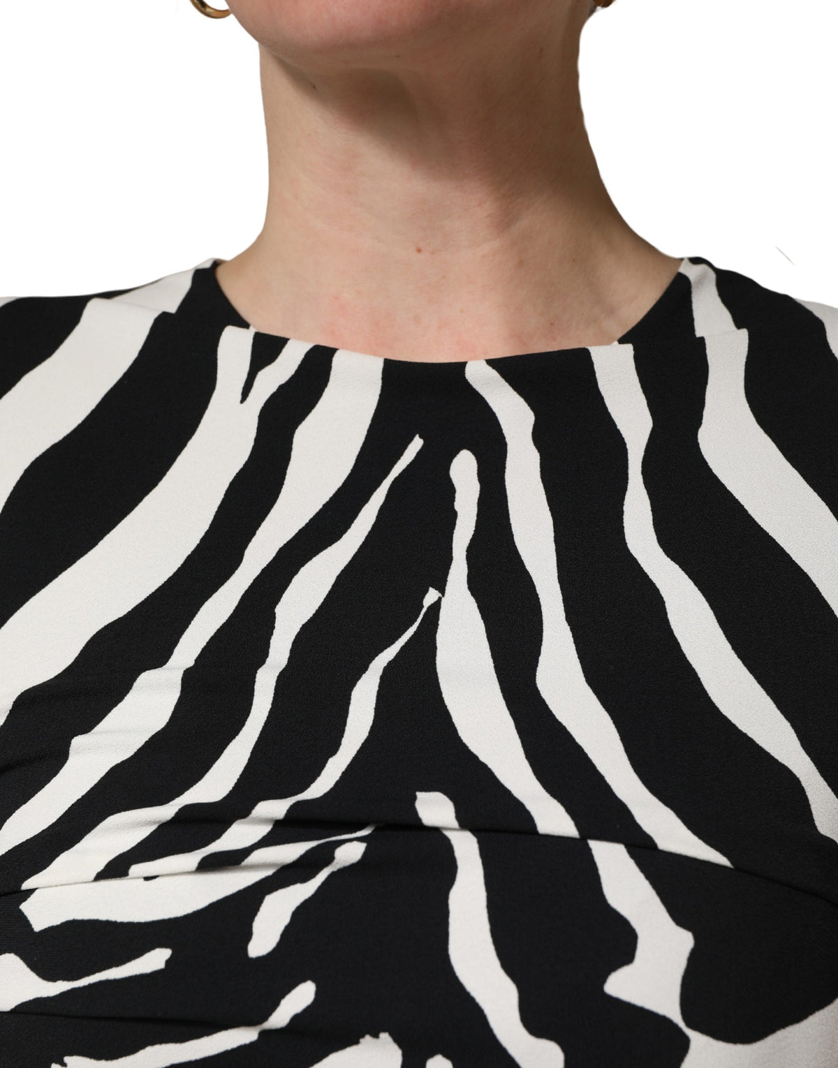 Experience the allure of Dolce & Gabbana's Black White Zebra Cady Dress, a testament to exquisite Italian craftsmanship and timeless elegance, perfect for any sophisticated occasion.