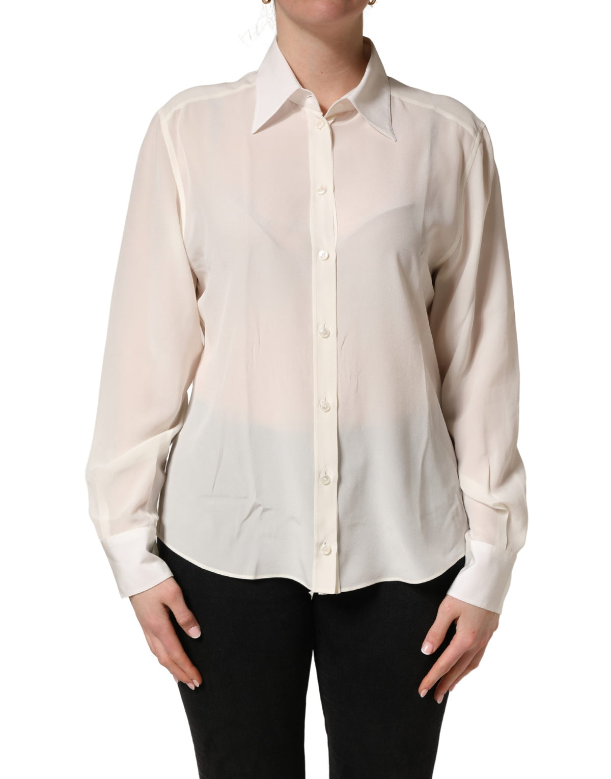 Indulge in the timeless elegance of the Dolce & Gabbana Off White Collared Long Sleeves Blouse, a luxurious silk masterpiece that embodies sophistication and refined Italian craftsmanship.